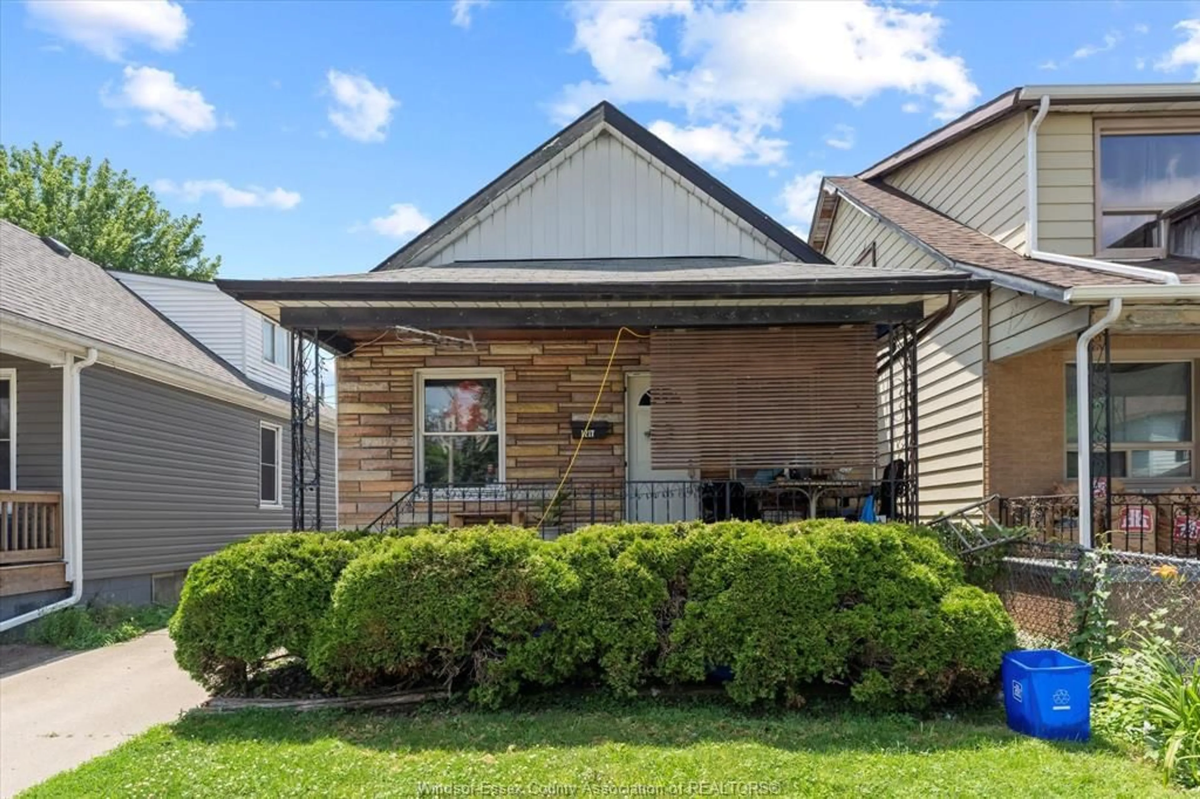 Home with vinyl exterior material, street for 1217 Henry Ford Centre, Windsor Ontario N8Y 2T7