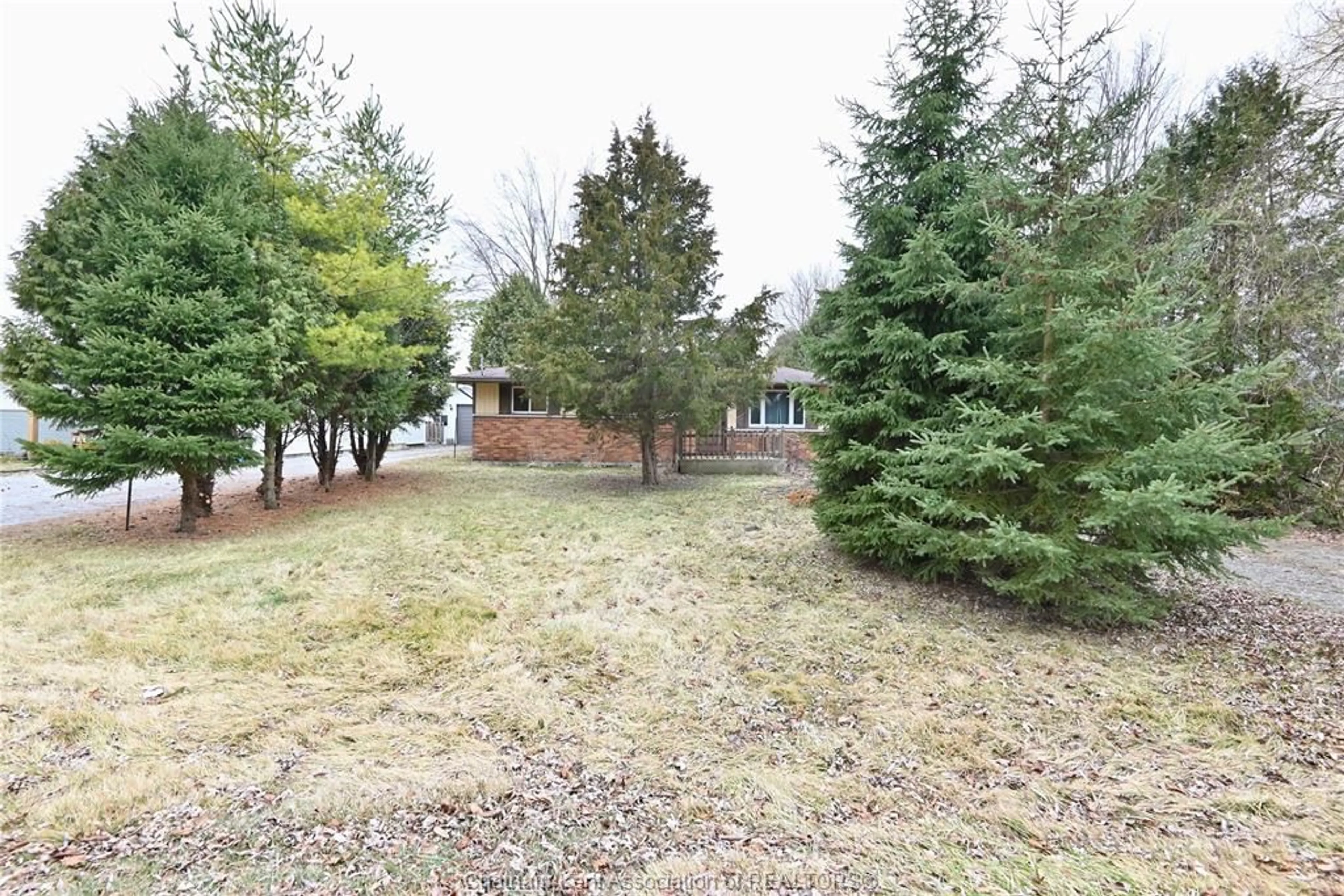 A pic from outside/outdoor area/front of a property/back of a property/a pic from drone, forest/trees view for 32 IRWIN Dr, Wallaceburg Ontario N8A 4S1