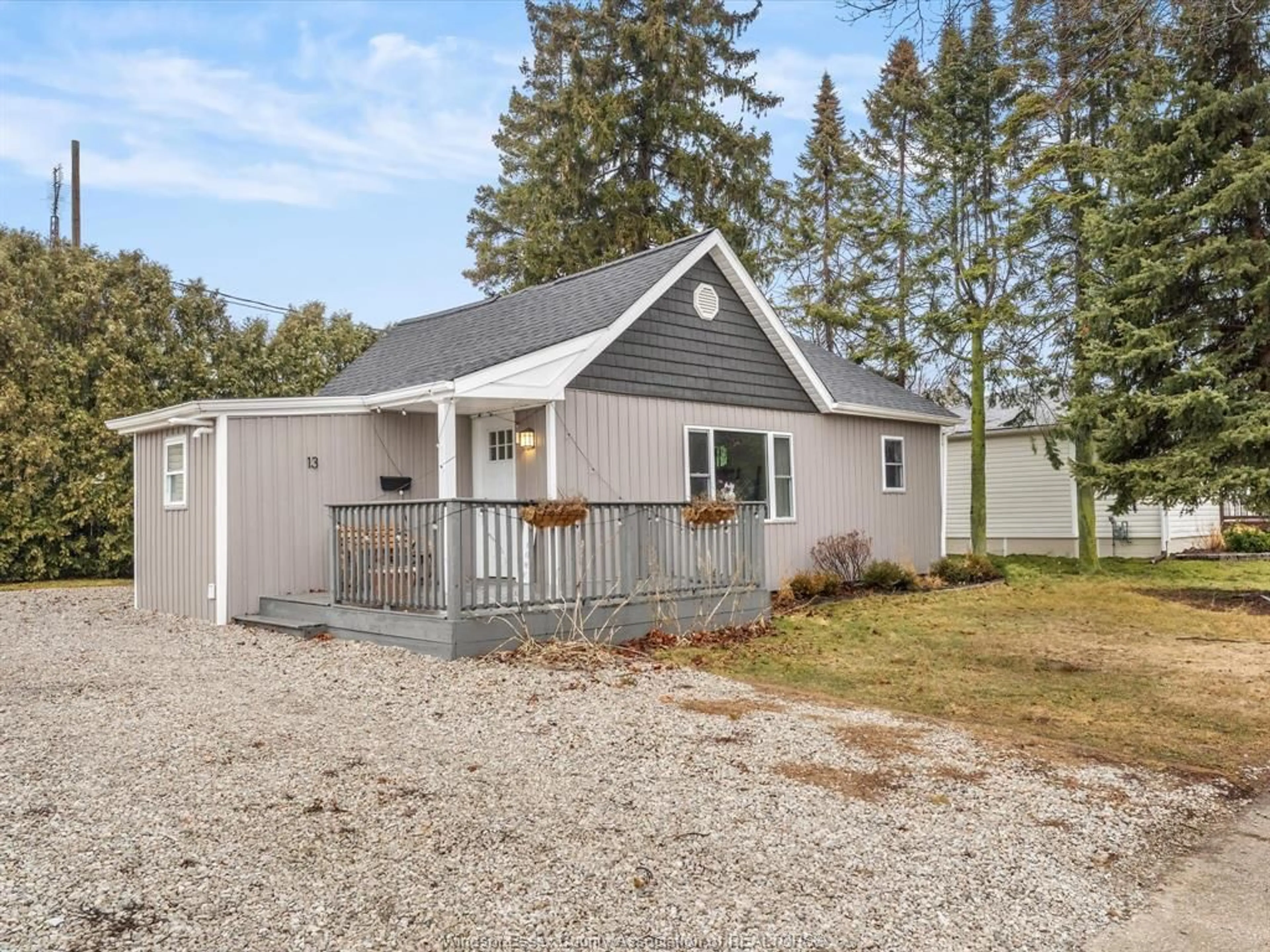 Home with vinyl exterior material, street for 13 MARTIN, Leamington Ontario N8H 2R5