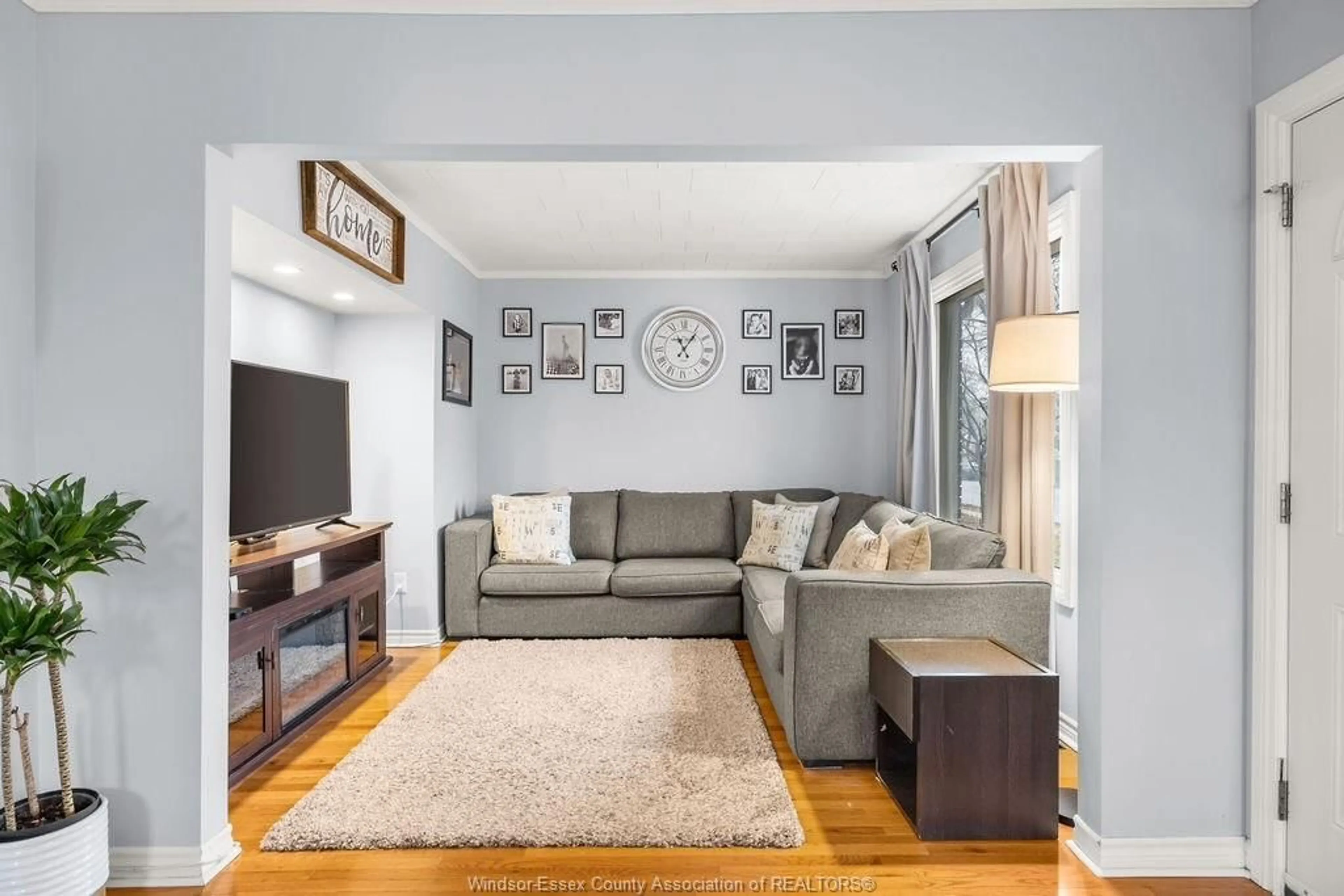 Living room with furniture, unknown for 1726 Pillette Rd, Windsor Ontario N8Y 3C6