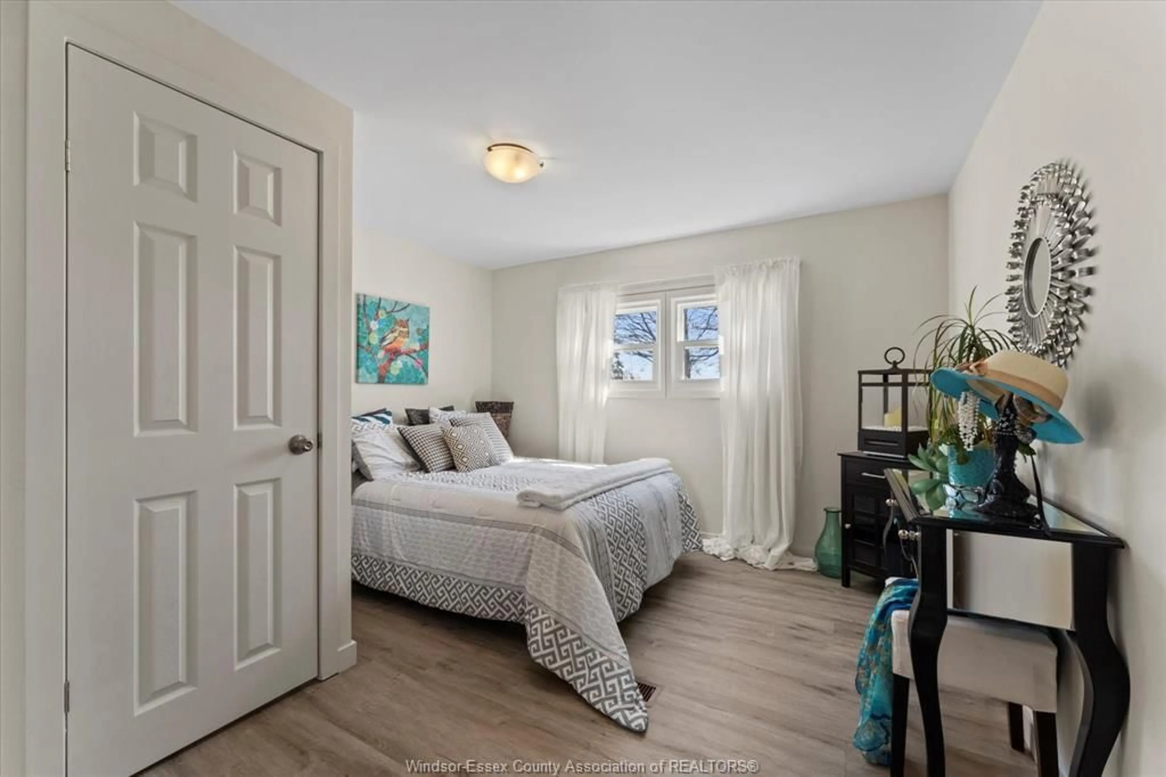 Bedroom with bed, wood/laminate floor for 709 HERITAGE Rd #19, Kingsville Ontario N9Y 3B1