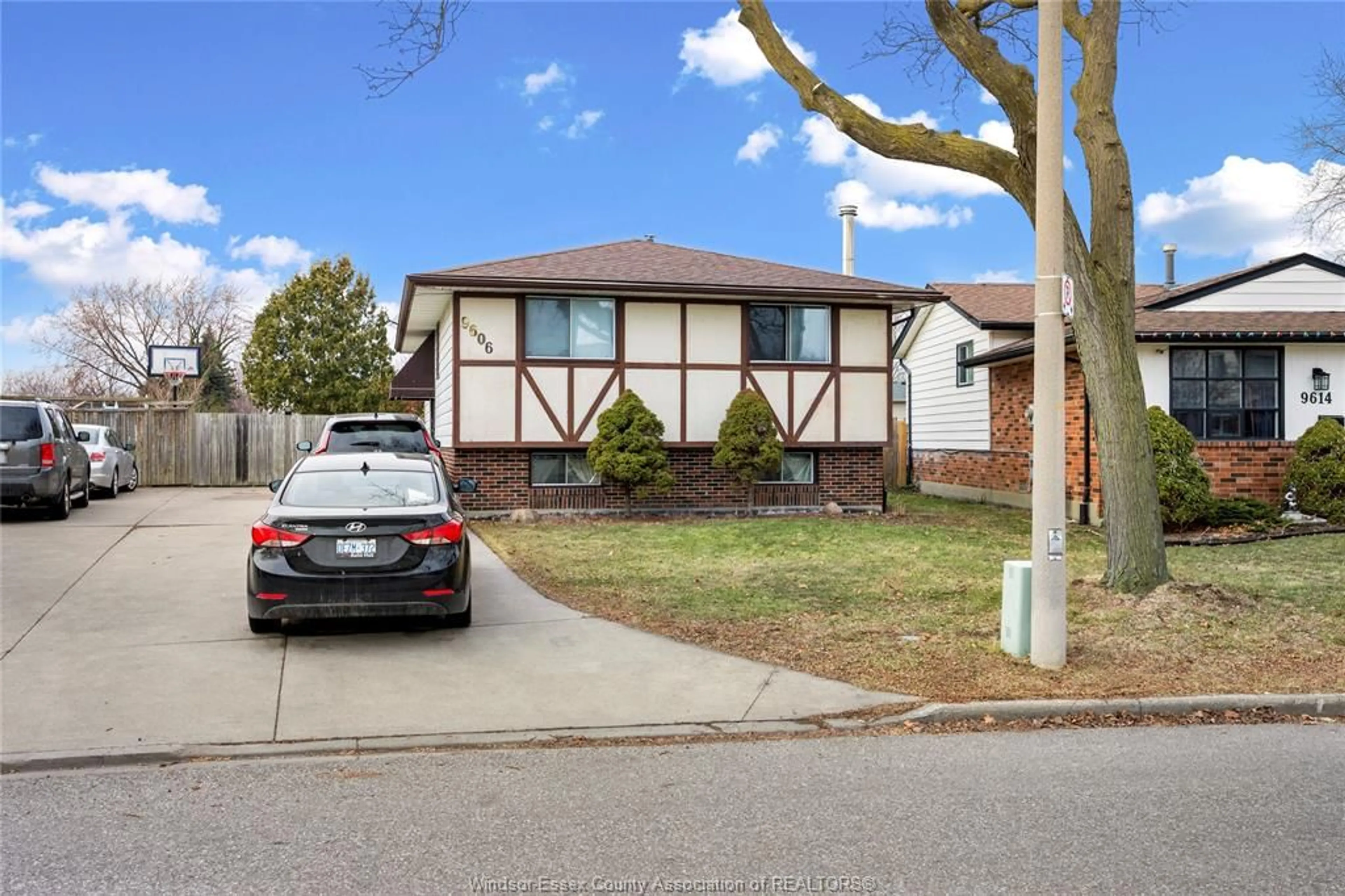 Home with brick exterior material, street for 9606 AVERY Lane, Windsor Ontario N8R 2A2
