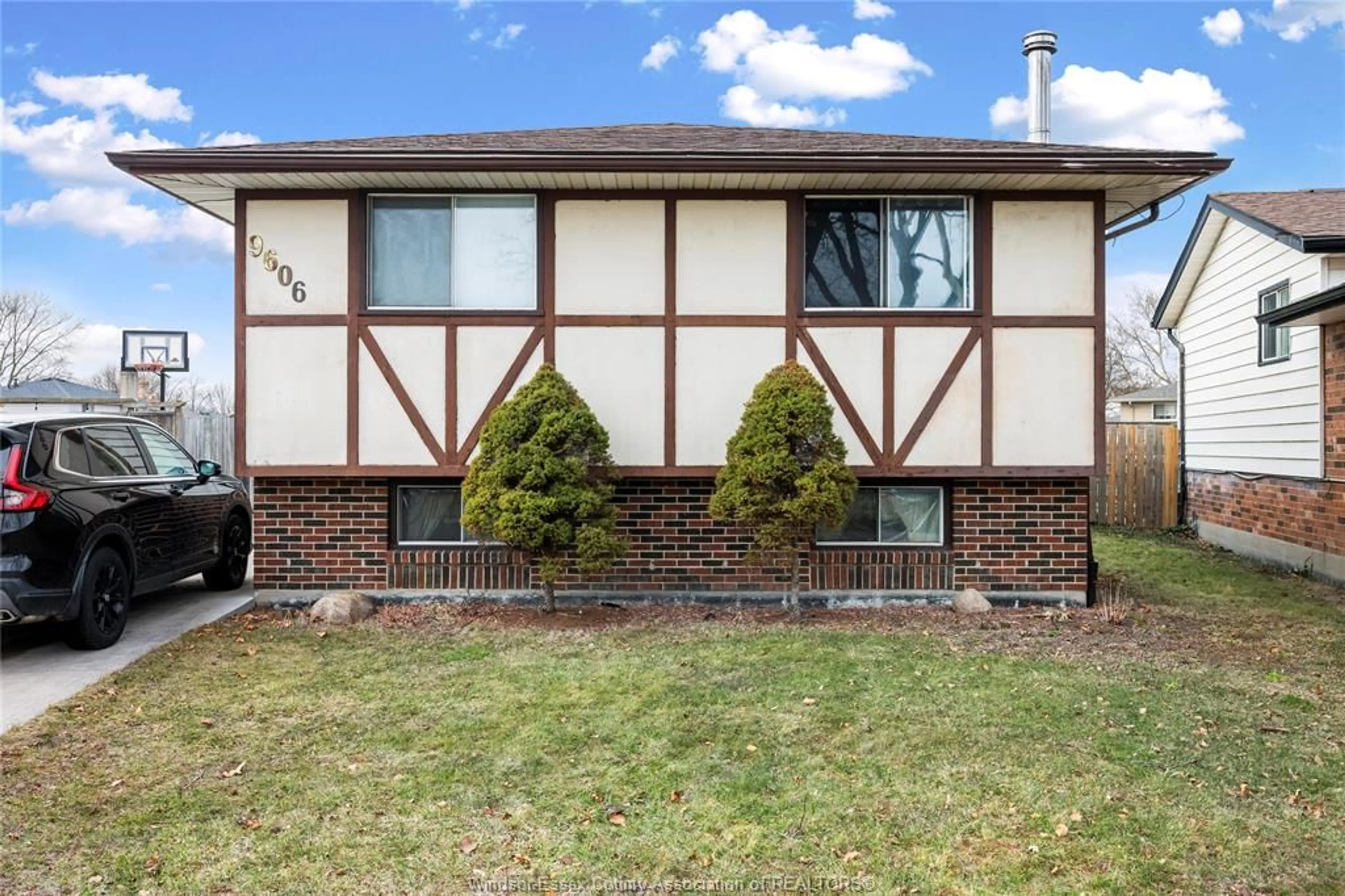 Home with brick exterior material, street for 9606 AVERY Lane, Windsor Ontario N8R 2A2