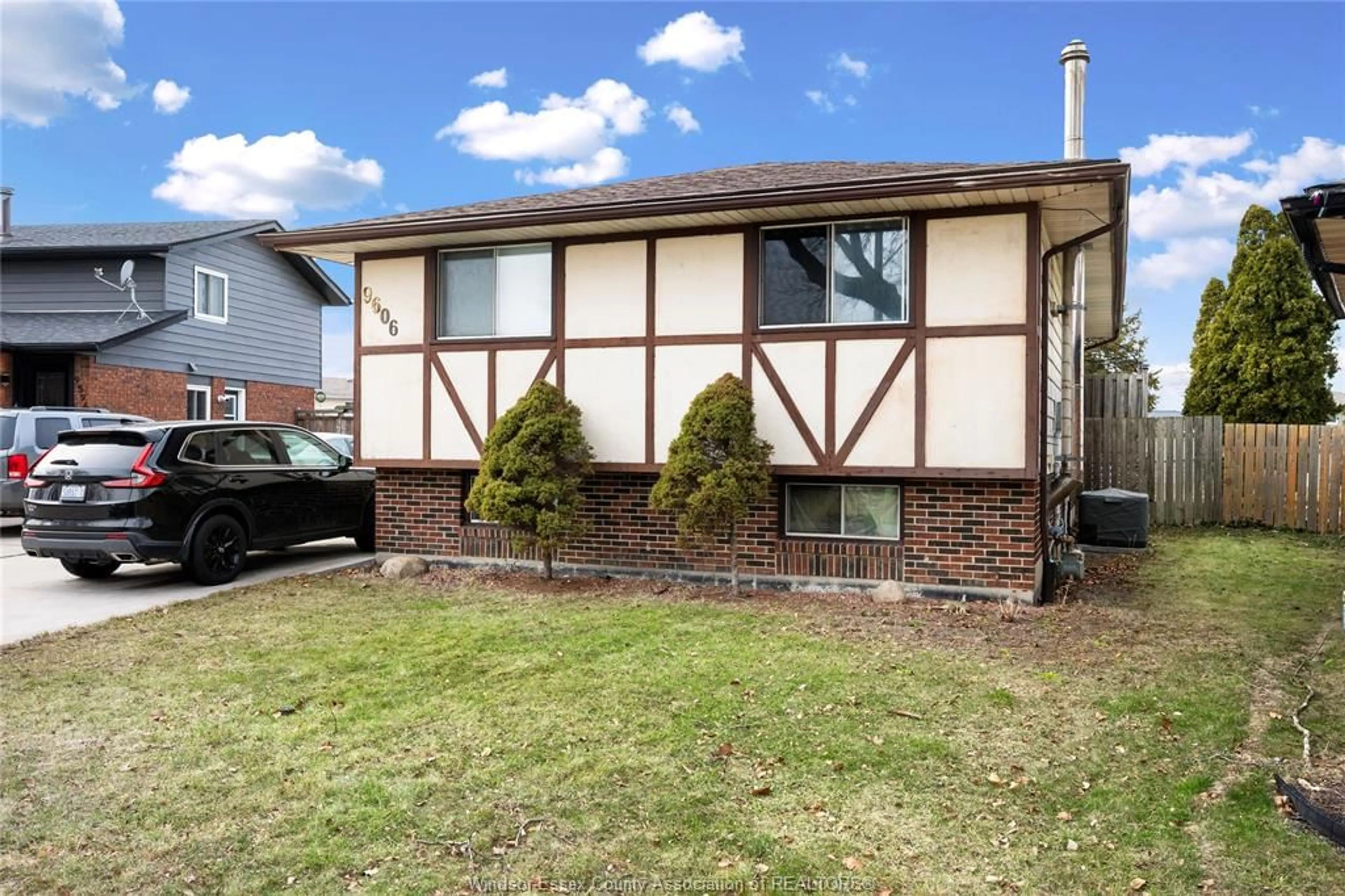 Home with vinyl exterior material, street for 9606 AVERY Lane, Windsor Ontario N8R 2A2