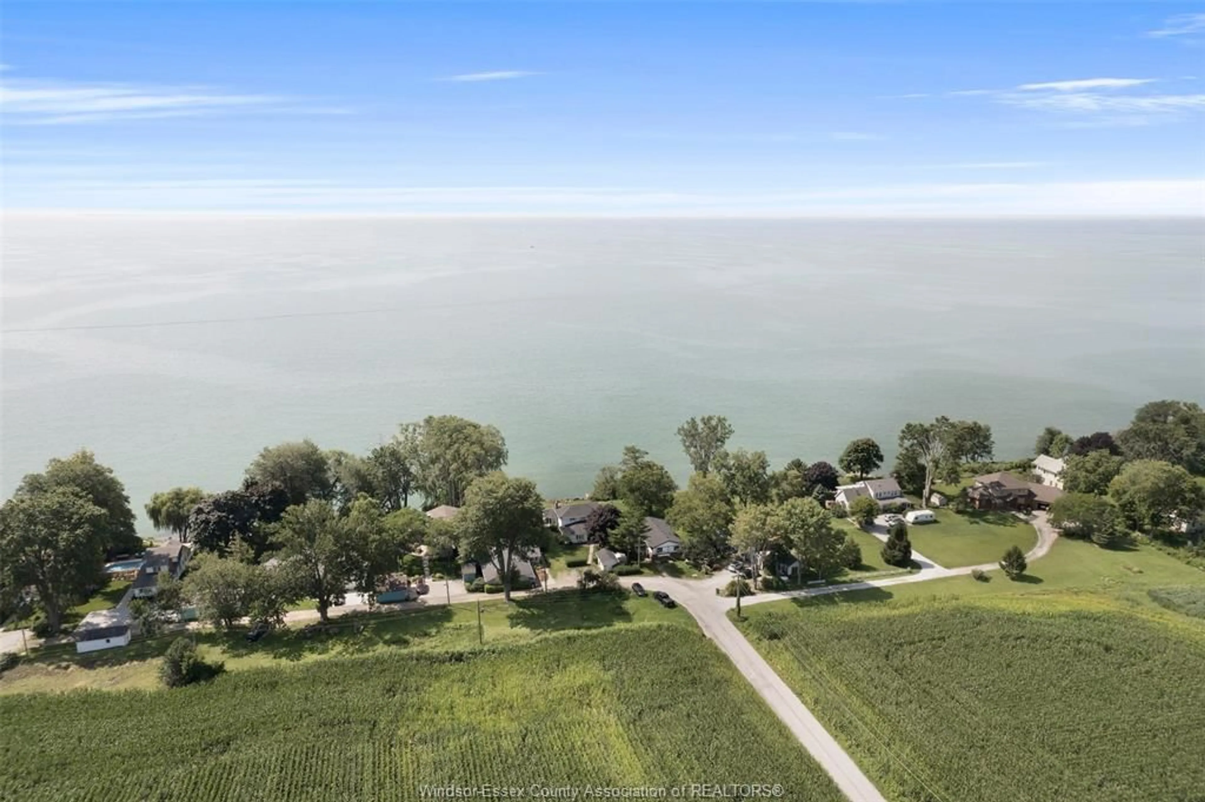 A pic from outside/outdoor area/front of a property/back of a property/a pic from drone, water/lake/river/ocean view for 659 MCCRACKEN, Kingsville Ontario N9Y 2N9
