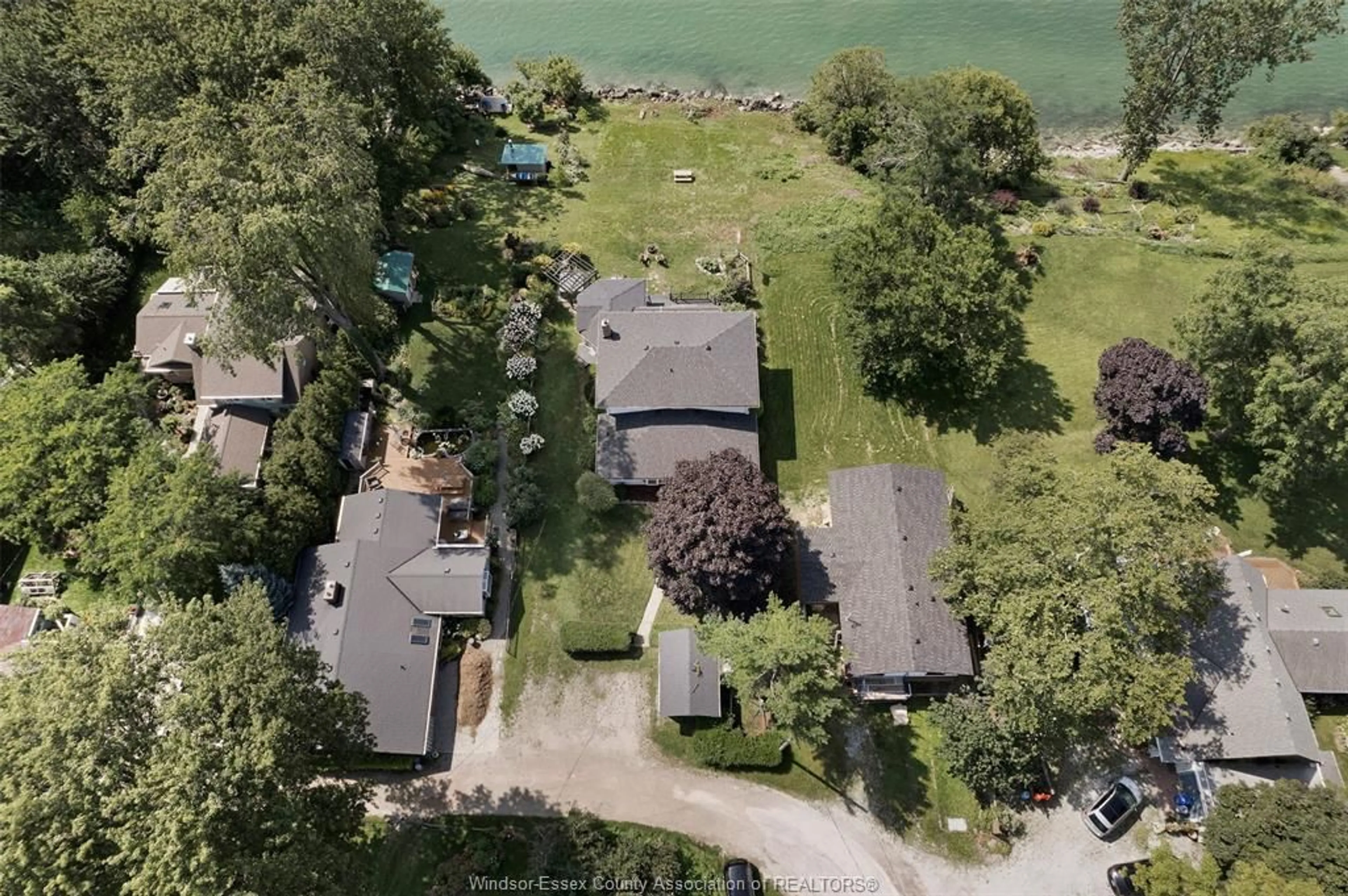 A pic from outside/outdoor area/front of a property/back of a property/a pic from drone, water/lake/river/ocean view for 659 MCCRACKEN, Kingsville Ontario N9Y 2N9
