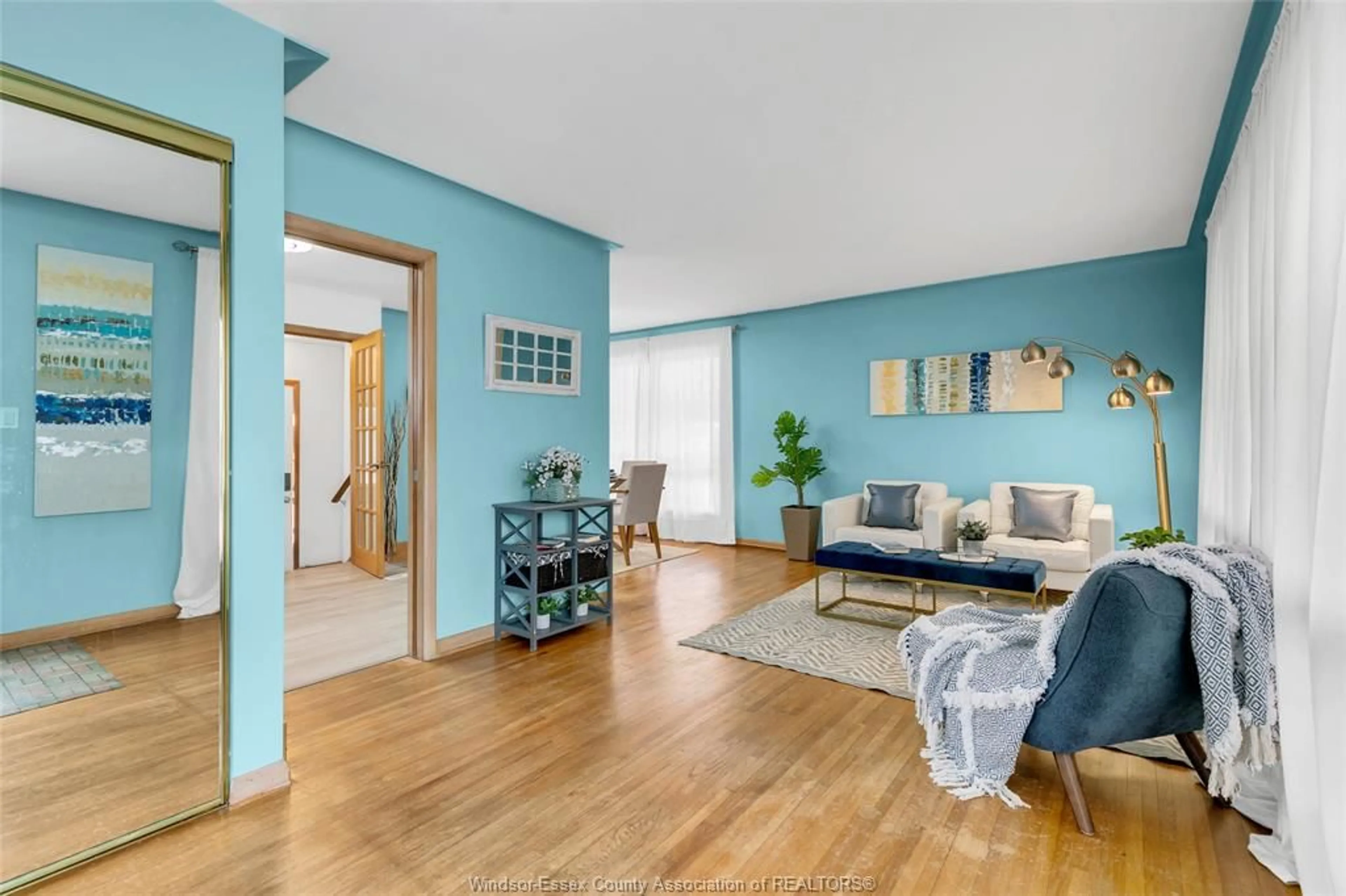 Living room with furniture, wood/laminate floor for 3425 RANKIN, Windsor Ontario N9E 3C4