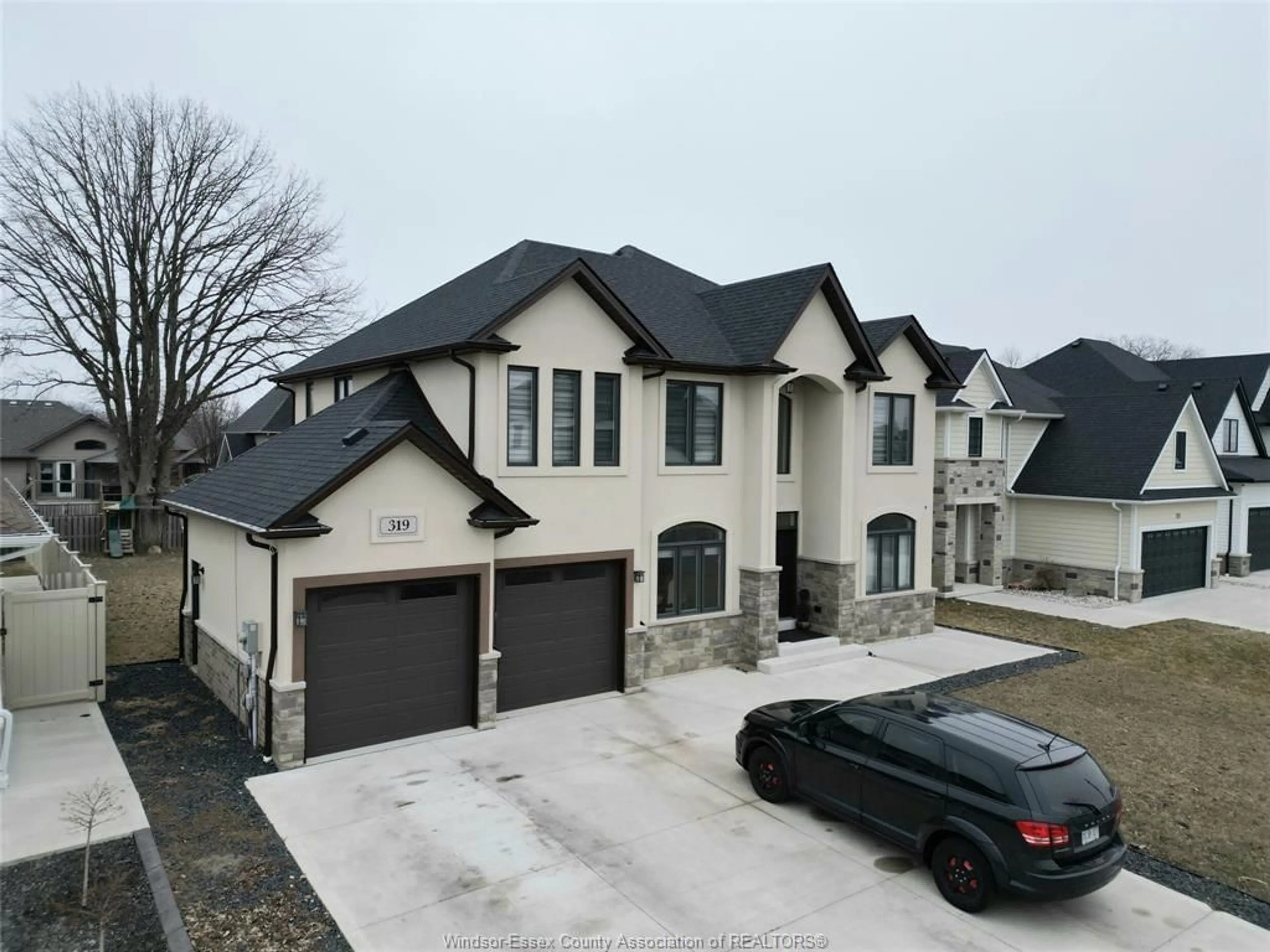 A pic from outside/outdoor area/front of a property/back of a property/a pic from drone, street for 319 CHRISTINE Ave, Belle River Ontario N8L 1B5