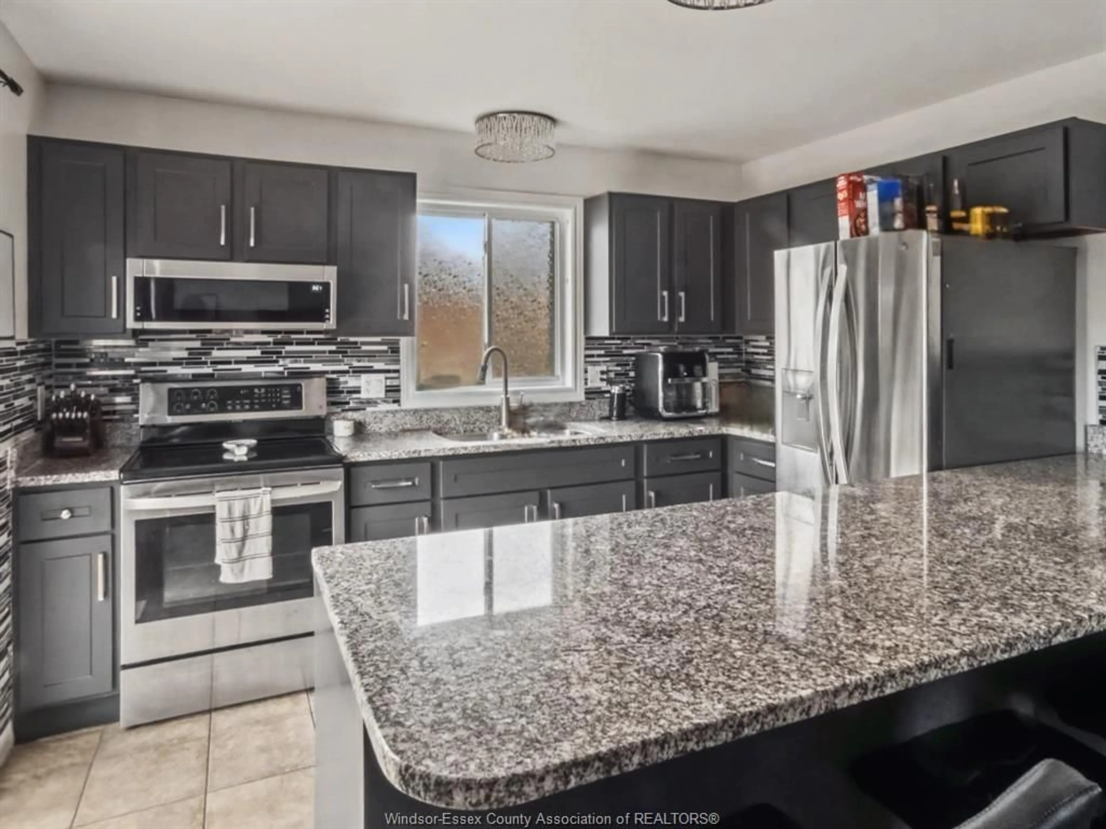 Open concept kitchen, ceramic/tile floor for 2120 CURRY Ave, Windsor Ontario N9B 3X9