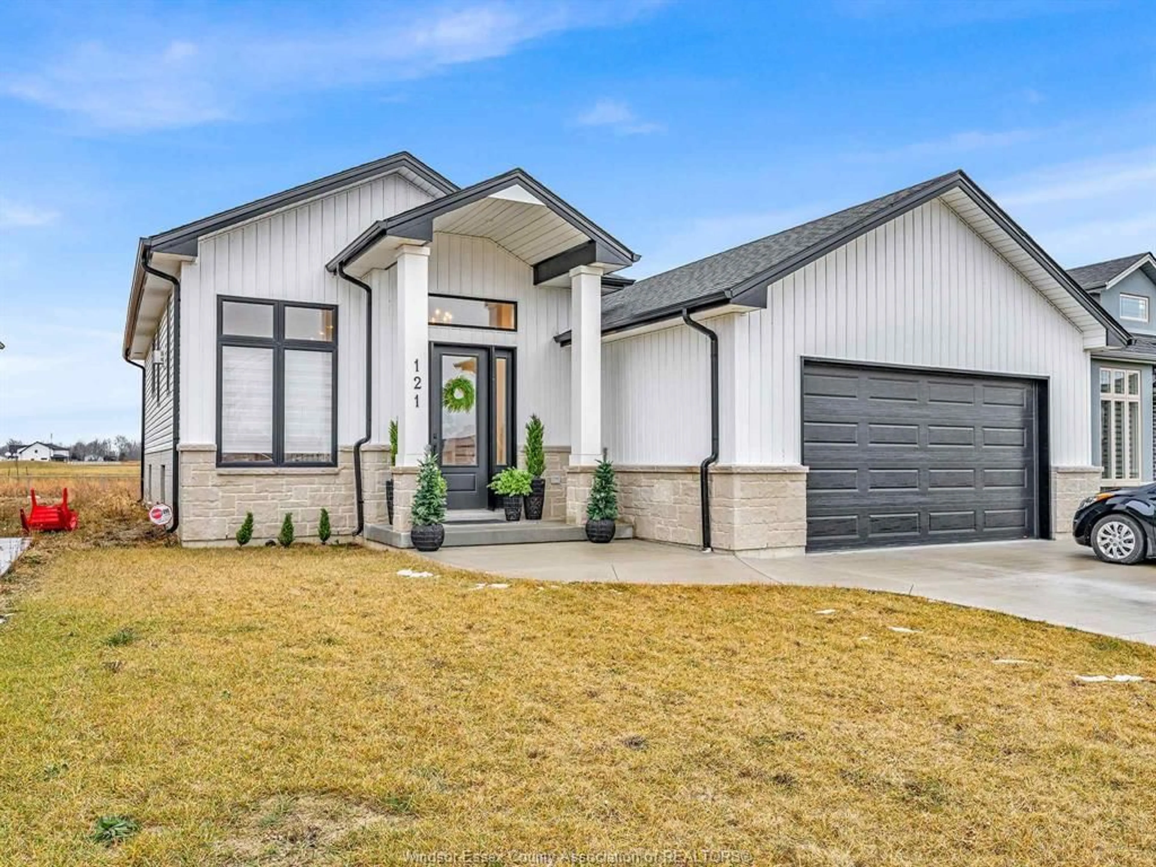 Home with brick exterior material, street for 121 Kingsbridge Dr, Amherstburg Ontario N9V 0G8