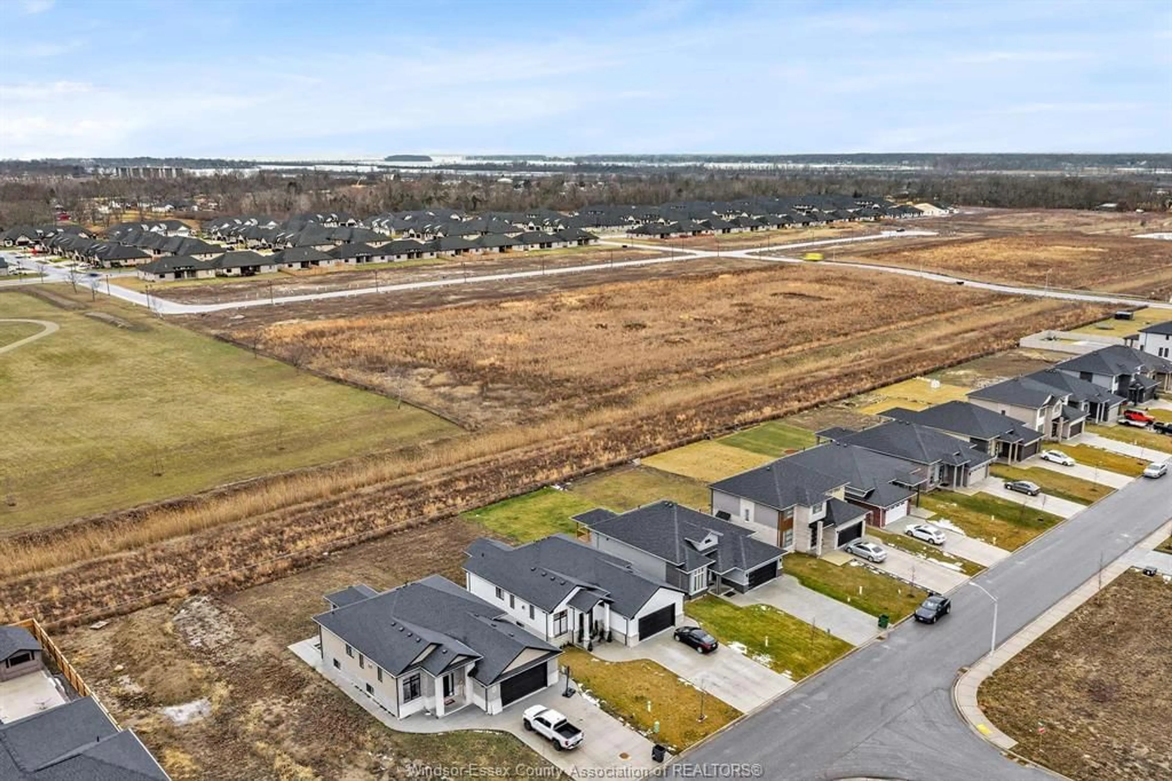 A pic from outside/outdoor area/front of a property/back of a property/a pic from drone, unknown for 121 Kingsbridge Dr, Amherstburg Ontario N9V 0G8