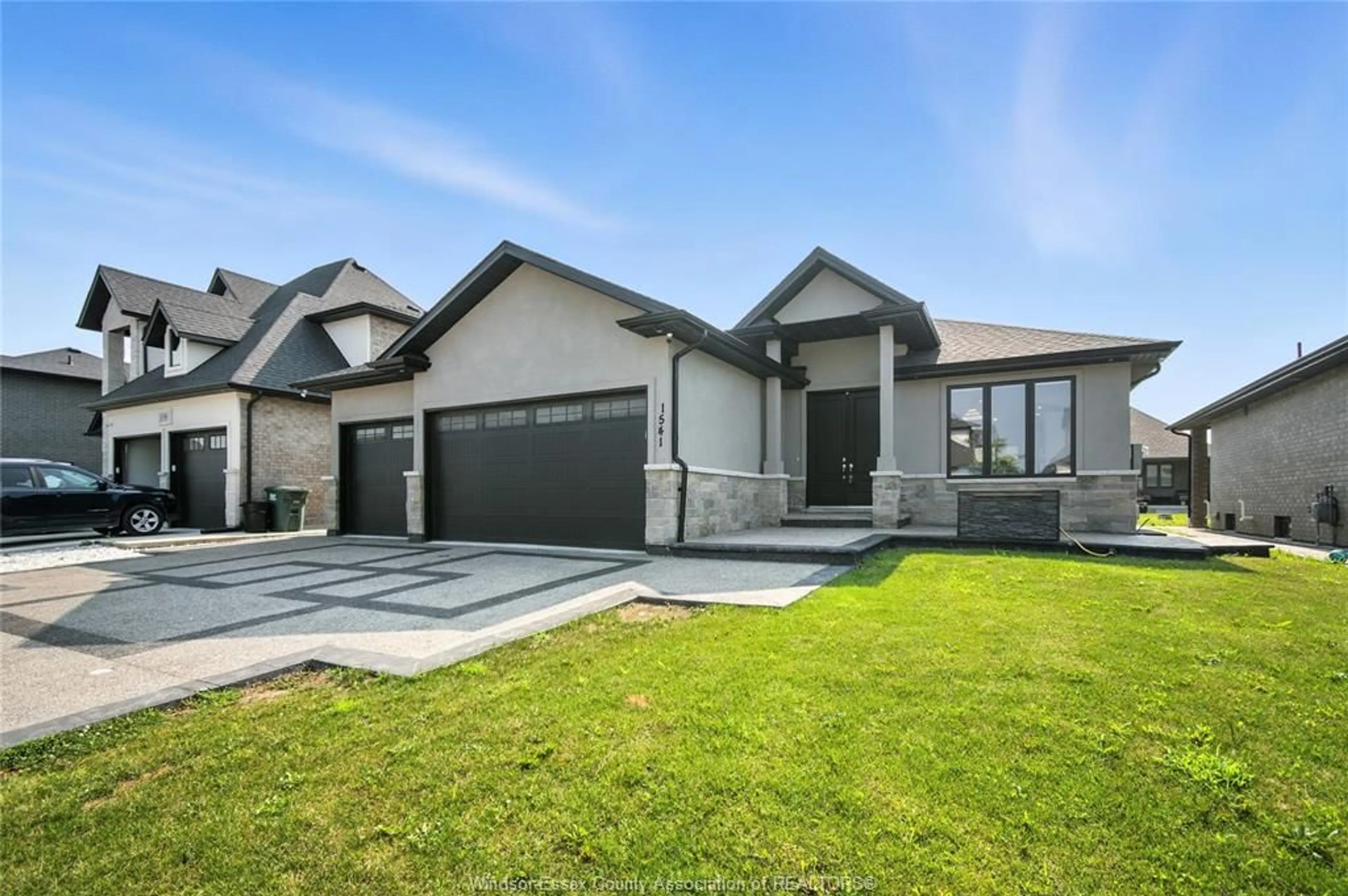 Home with vinyl exterior material, street for 1541 CLEARWATER Ave, Windsor Ontario N8P 0E9