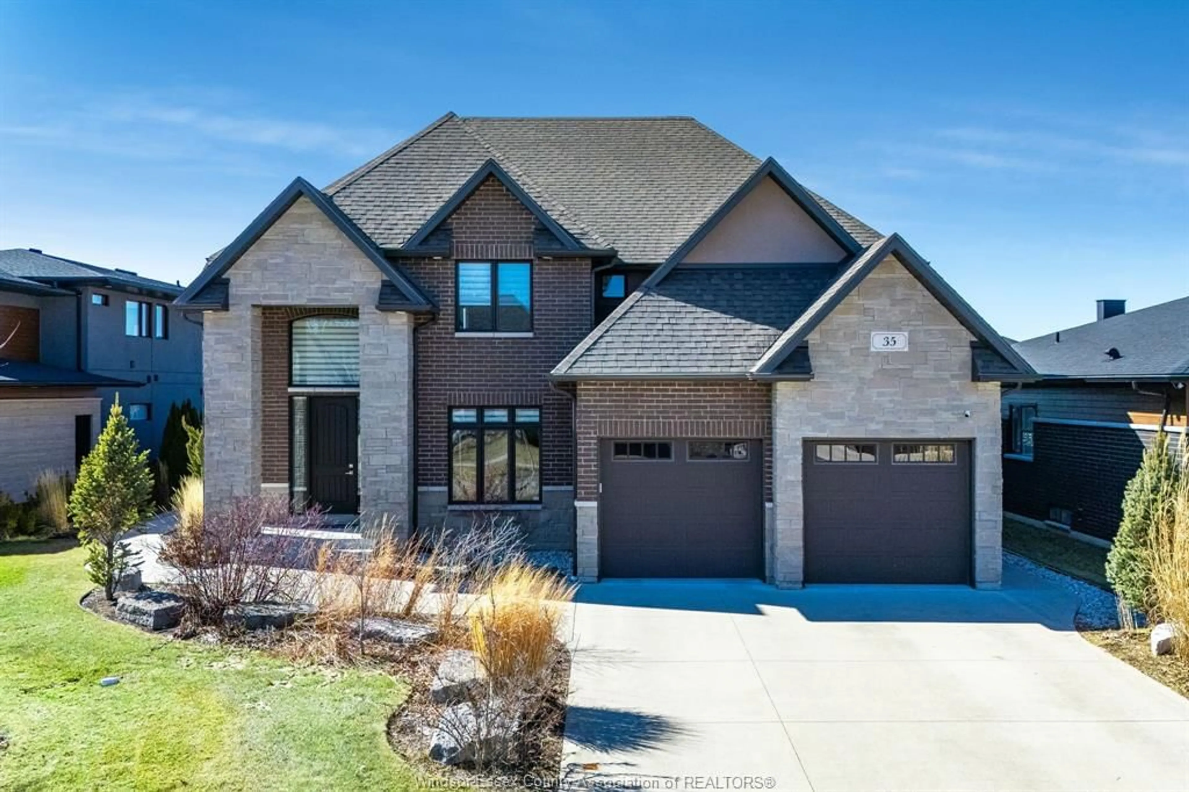 Home with brick exterior material, street for 35 Augusta Dr, Leamington Ontario N8H 0C7