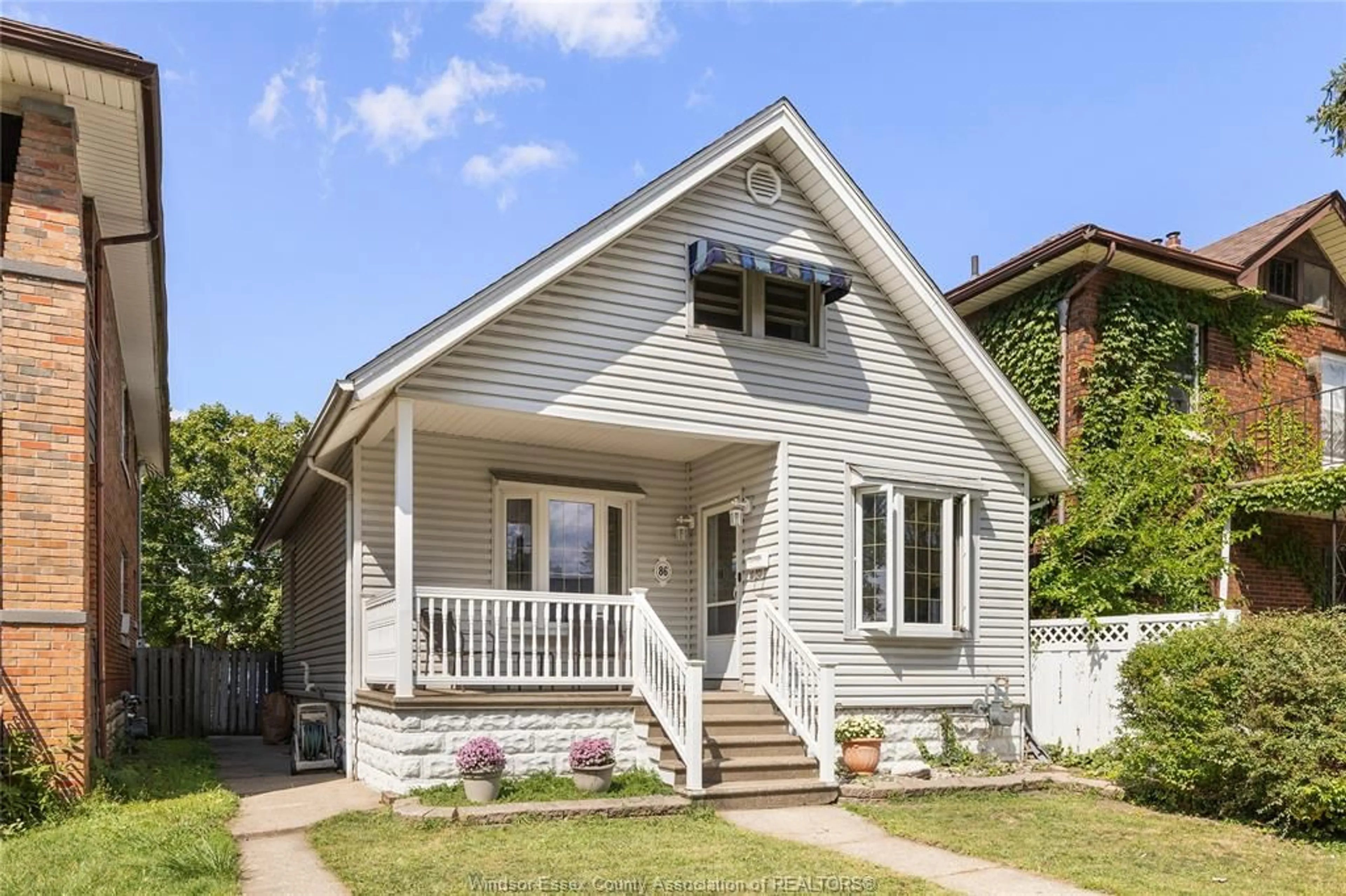 Home with vinyl exterior material, street for 86 HANNA St, Windsor Ontario N8X 2M9