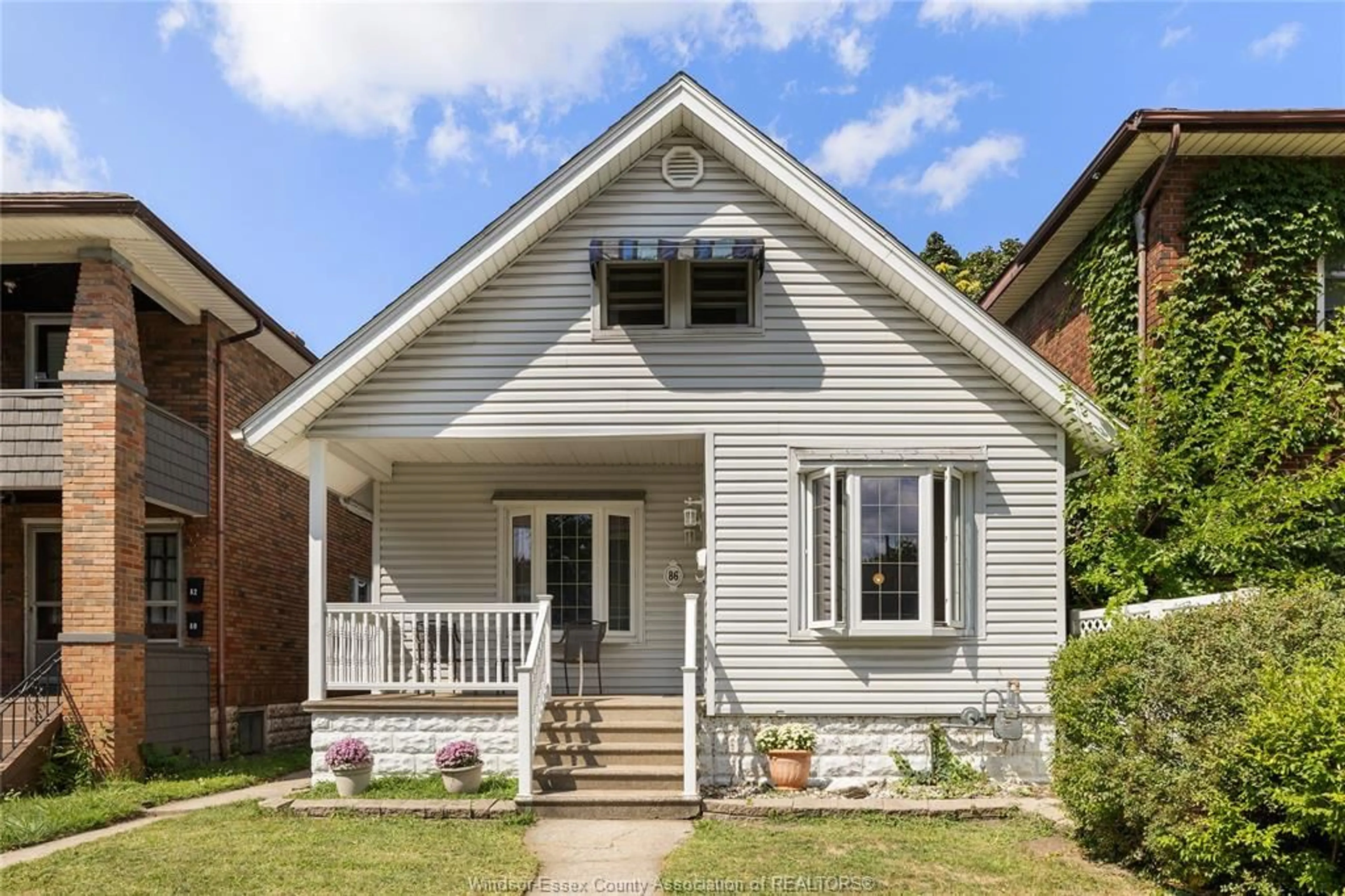 Home with brick exterior material, street for 86 HANNA St, Windsor Ontario N8X 2M9