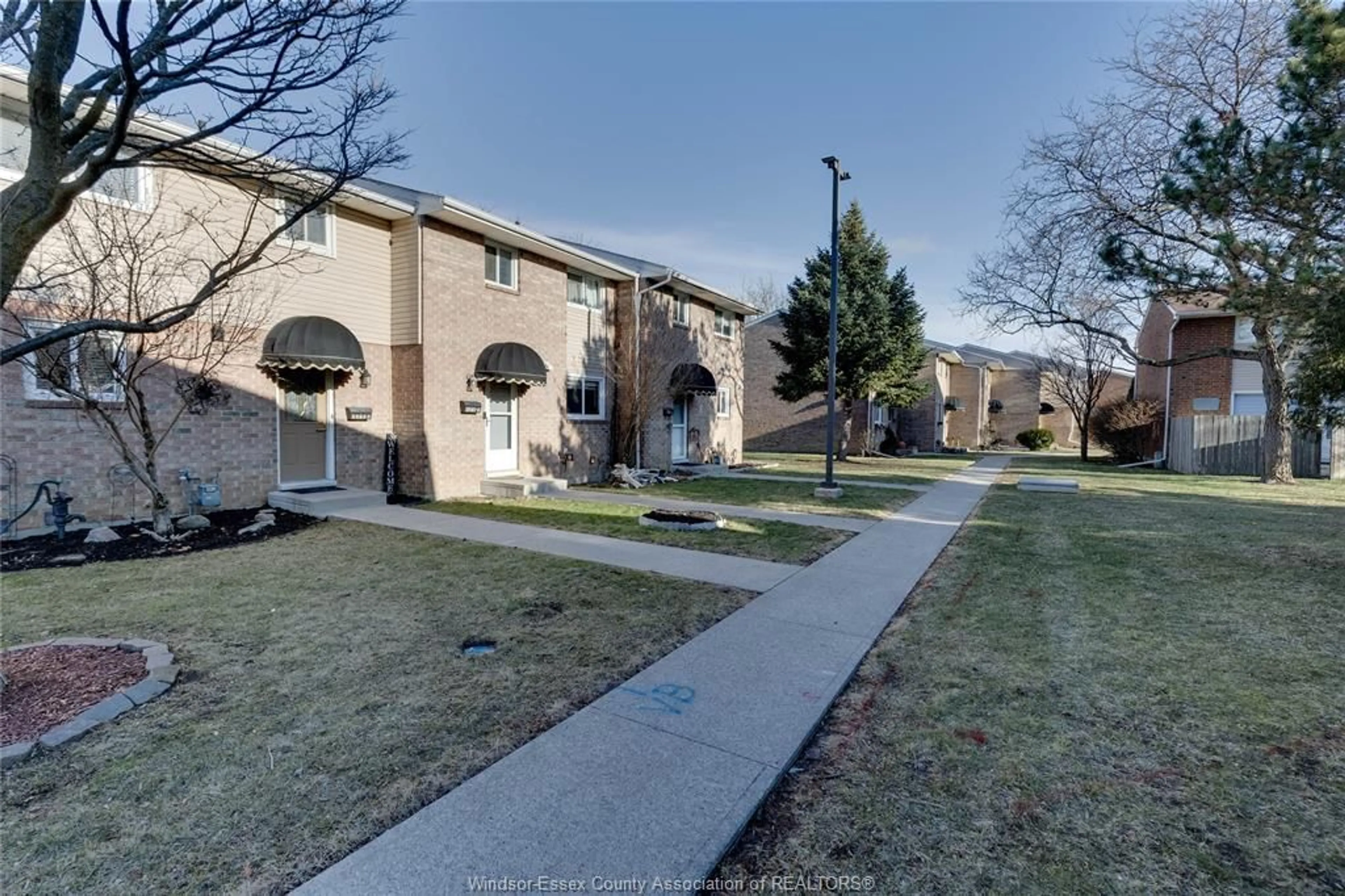 A pic from outside/outdoor area/front of a property/back of a property/a pic from drone, street for 9378 ESPLANADE Dr #4, Windsor Ontario N8R 2A3