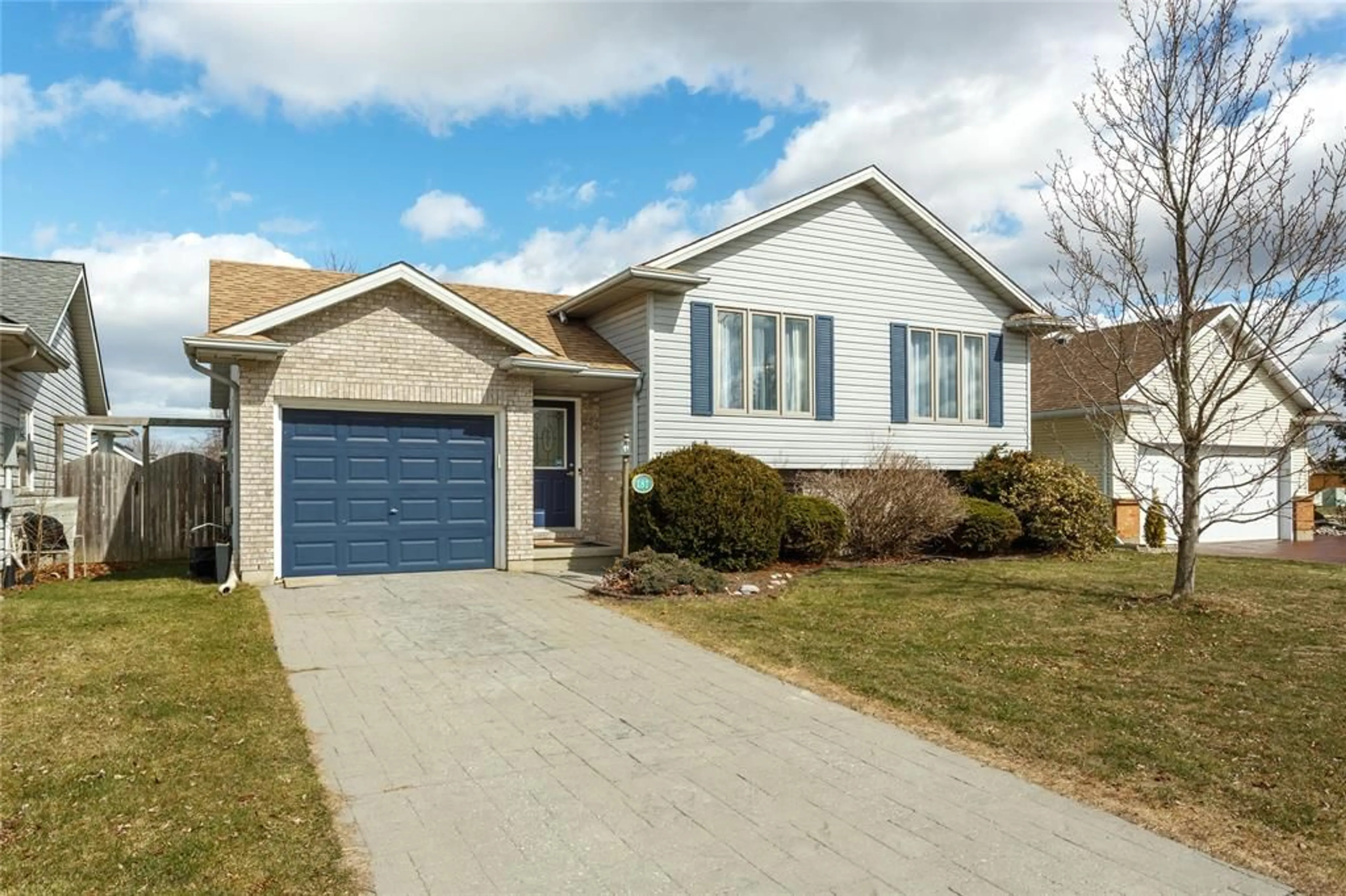 Home with brick exterior material, street for 181 PADDOCK GREEN Cir, St Clair Ontario N0N 1G0