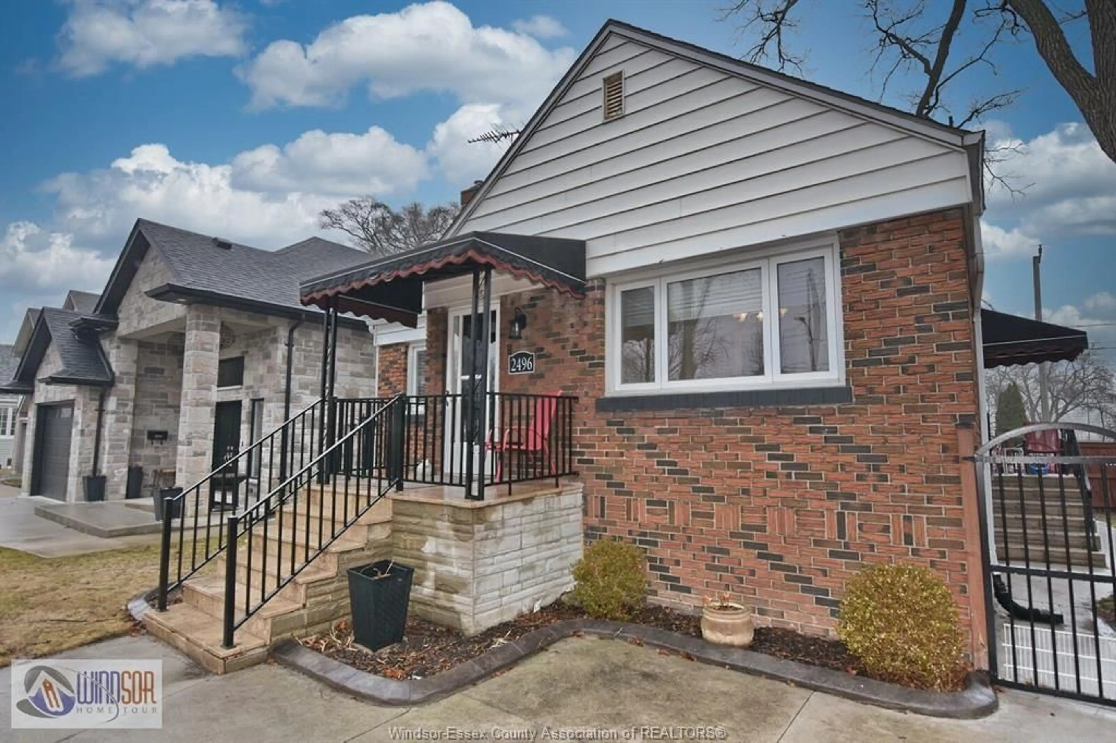 Home with brick exterior material, street for 2496 BYNG, Windsor Ontario N8W 3E8