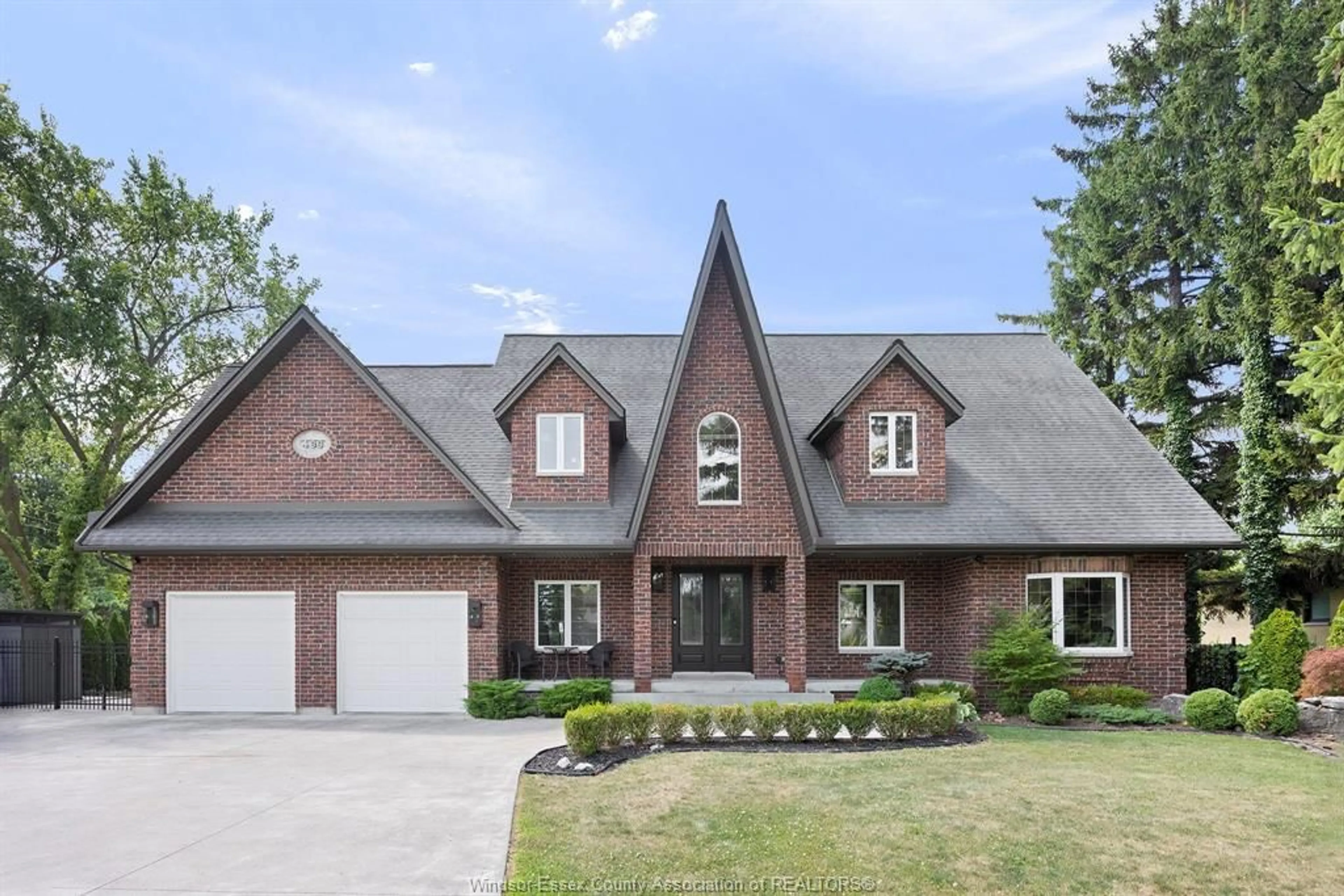 Home with brick exterior material, street for 499 OLD TECUMSEH, Lakeshore Ontario N8N 3T3