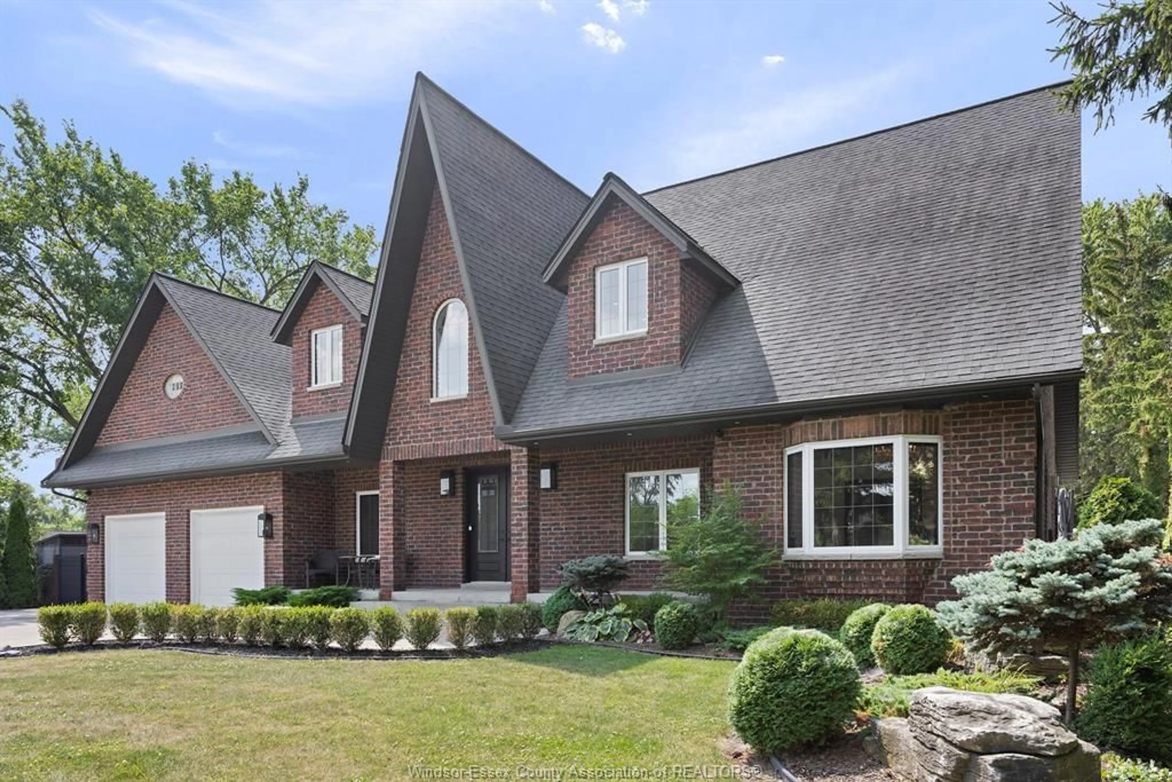 Home with brick exterior material, street for 499 OLD TECUMSEH, Lakeshore Ontario N8N 3T3