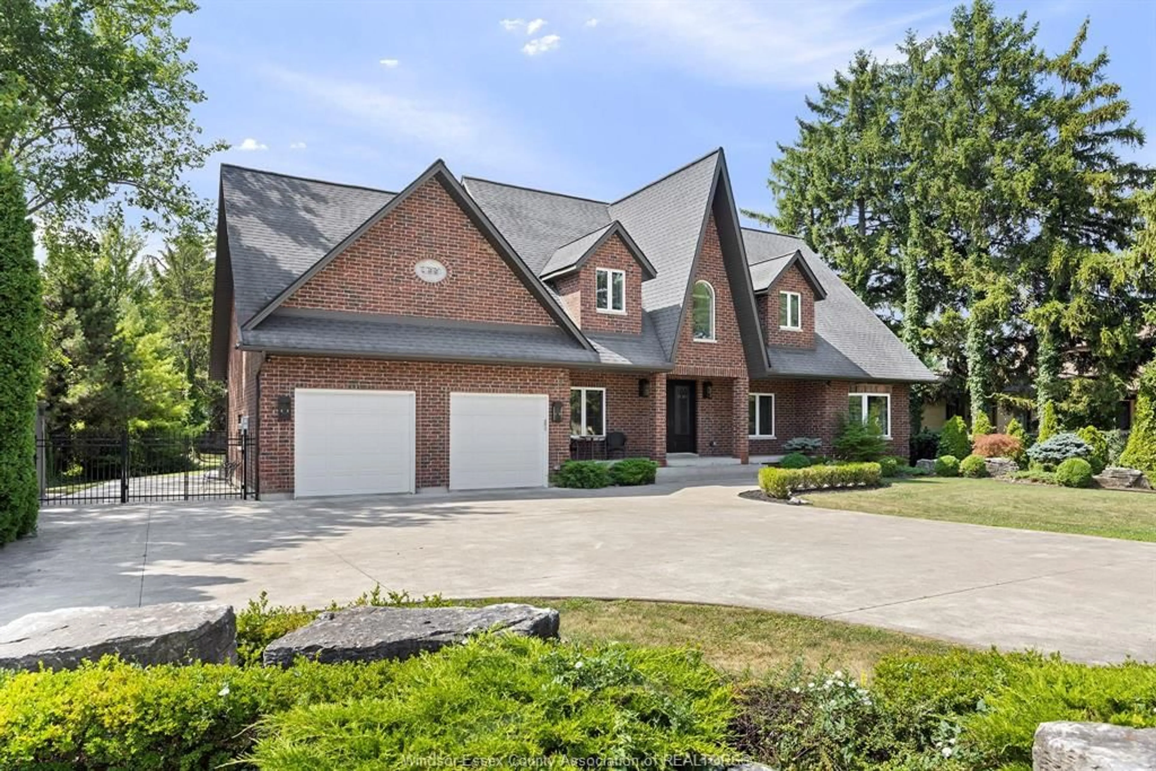 Home with brick exterior material, street for 499 OLD TECUMSEH, Lakeshore Ontario N8N 3T3