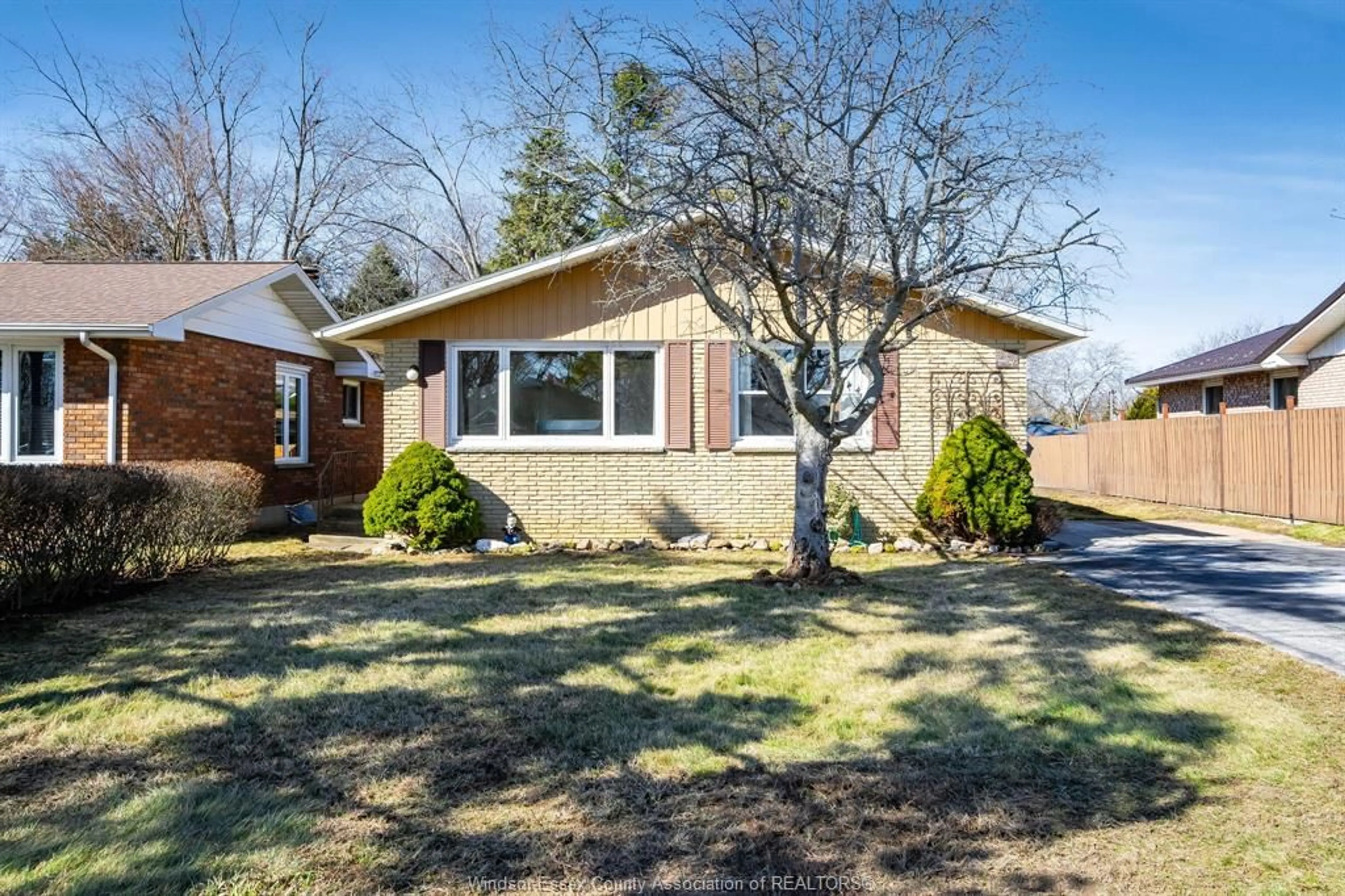 Home with brick exterior material, street for 332 Queen St, Kingsville Ontario N9Y 2J3