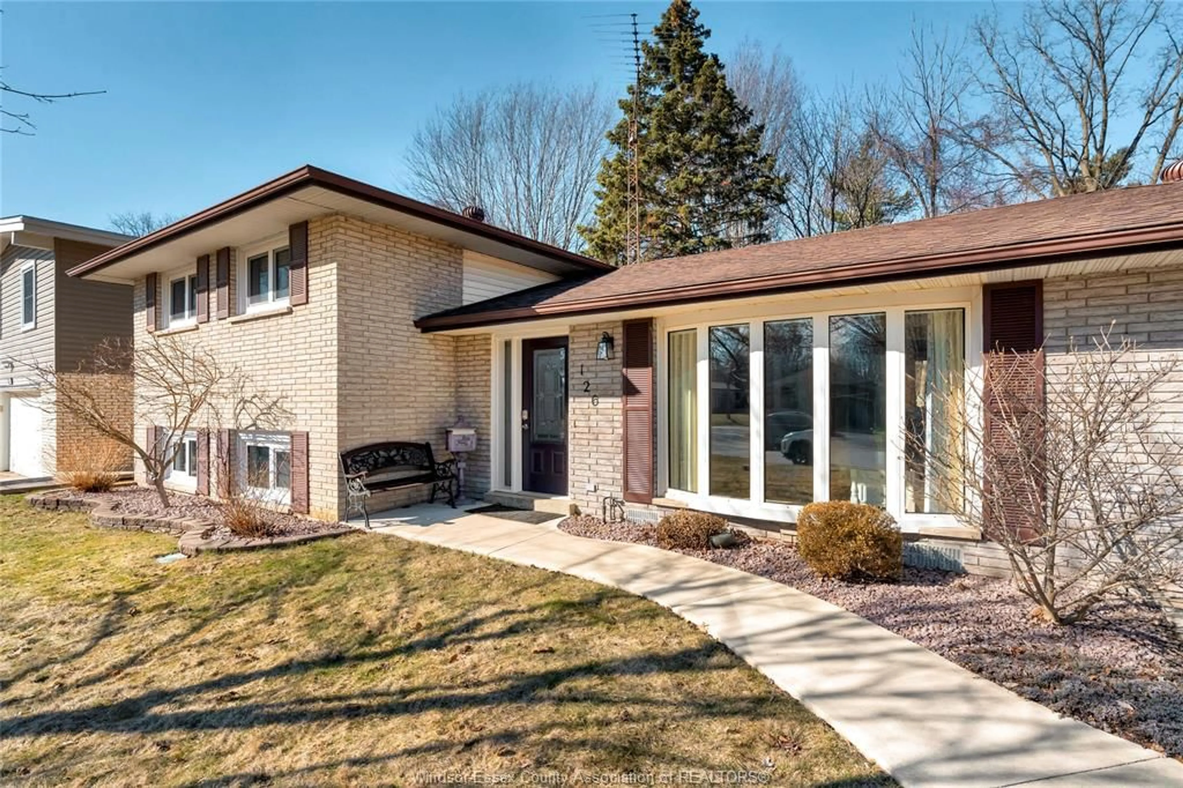 Home with brick exterior material, street for 126 WOODLAWN Cres, Kingsville Ontario N9Y 1Y6