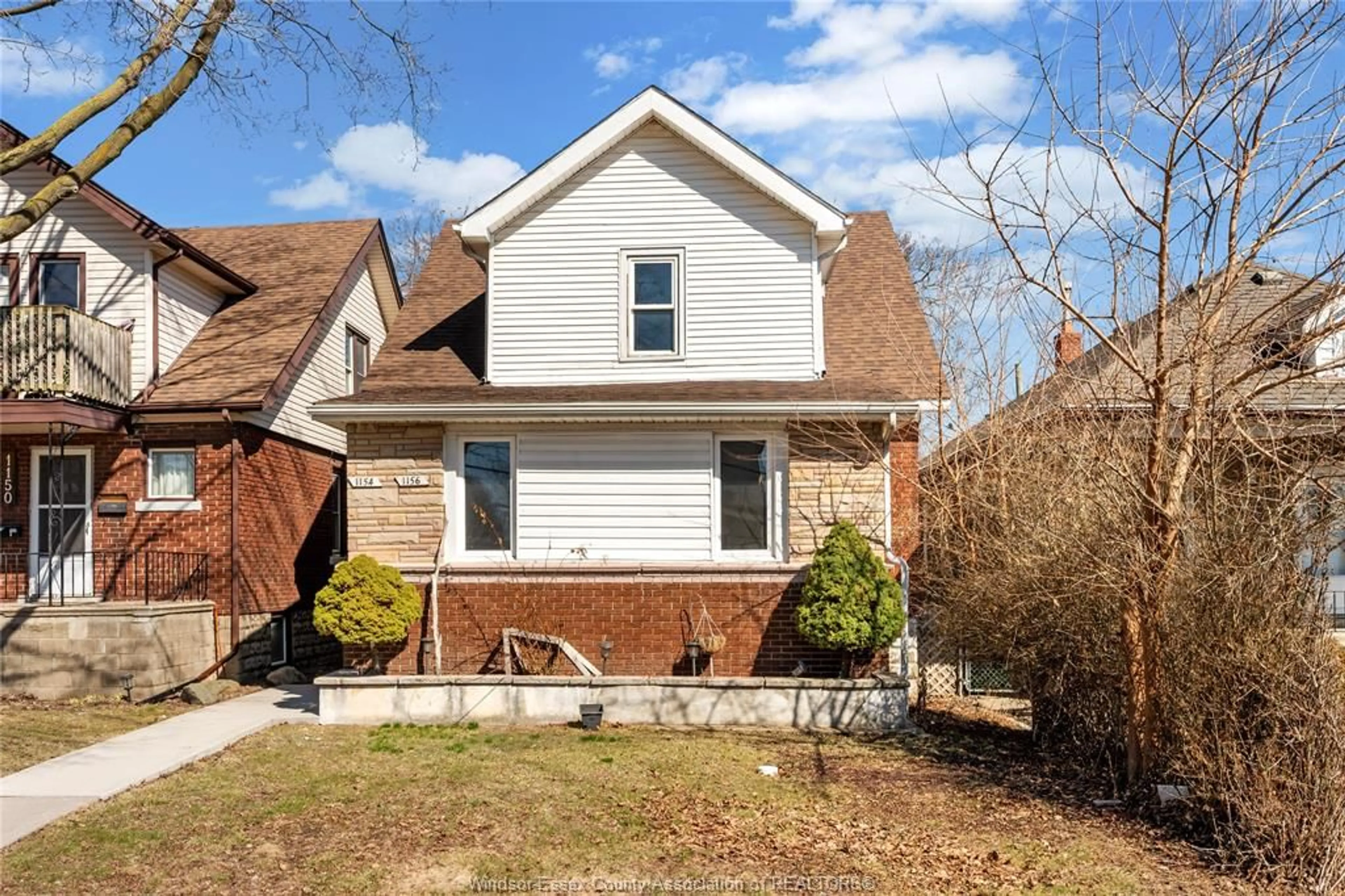 Home with brick exterior material, street for 1154-56 ELM, Windsor Ontario N9A 5H9