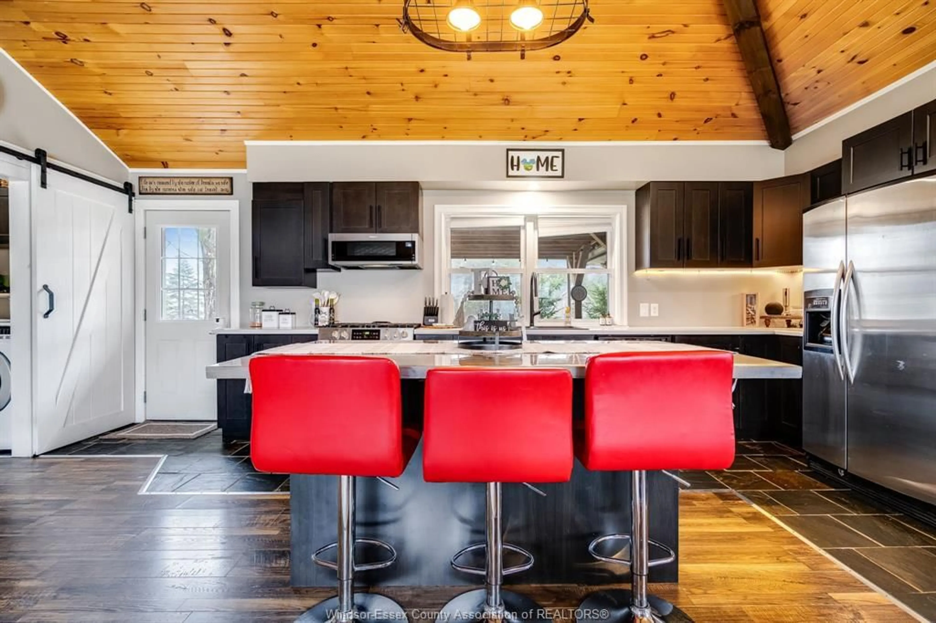 Open concept kitchen, wood/laminate floor for 64 RICHARD Ave, Wheatley Ontario N0P 2P0