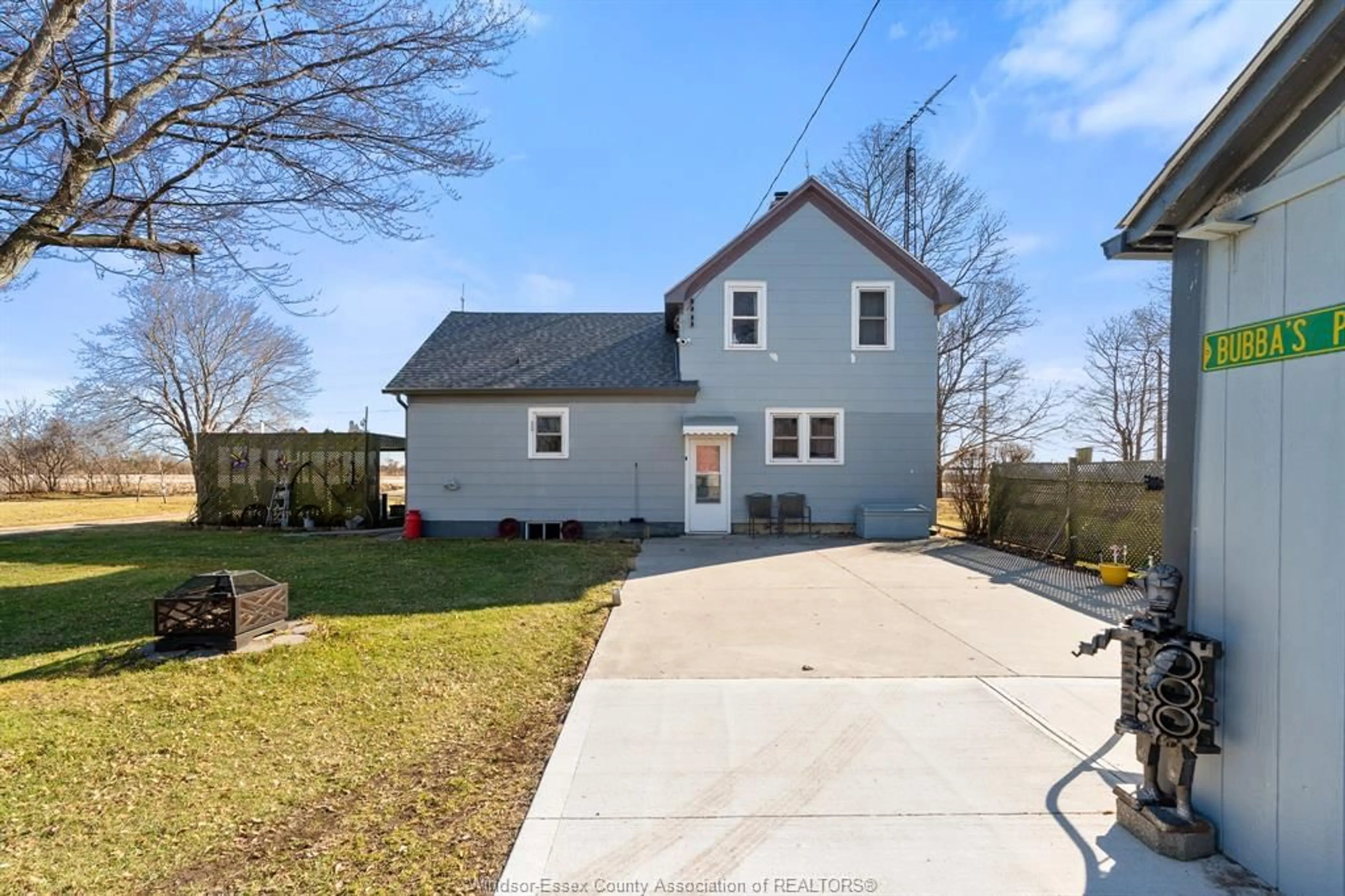 A pic from outside/outdoor area/front of a property/back of a property/a pic from drone, street for 2102 County Rd #20, Essex Ontario N0R 1G0