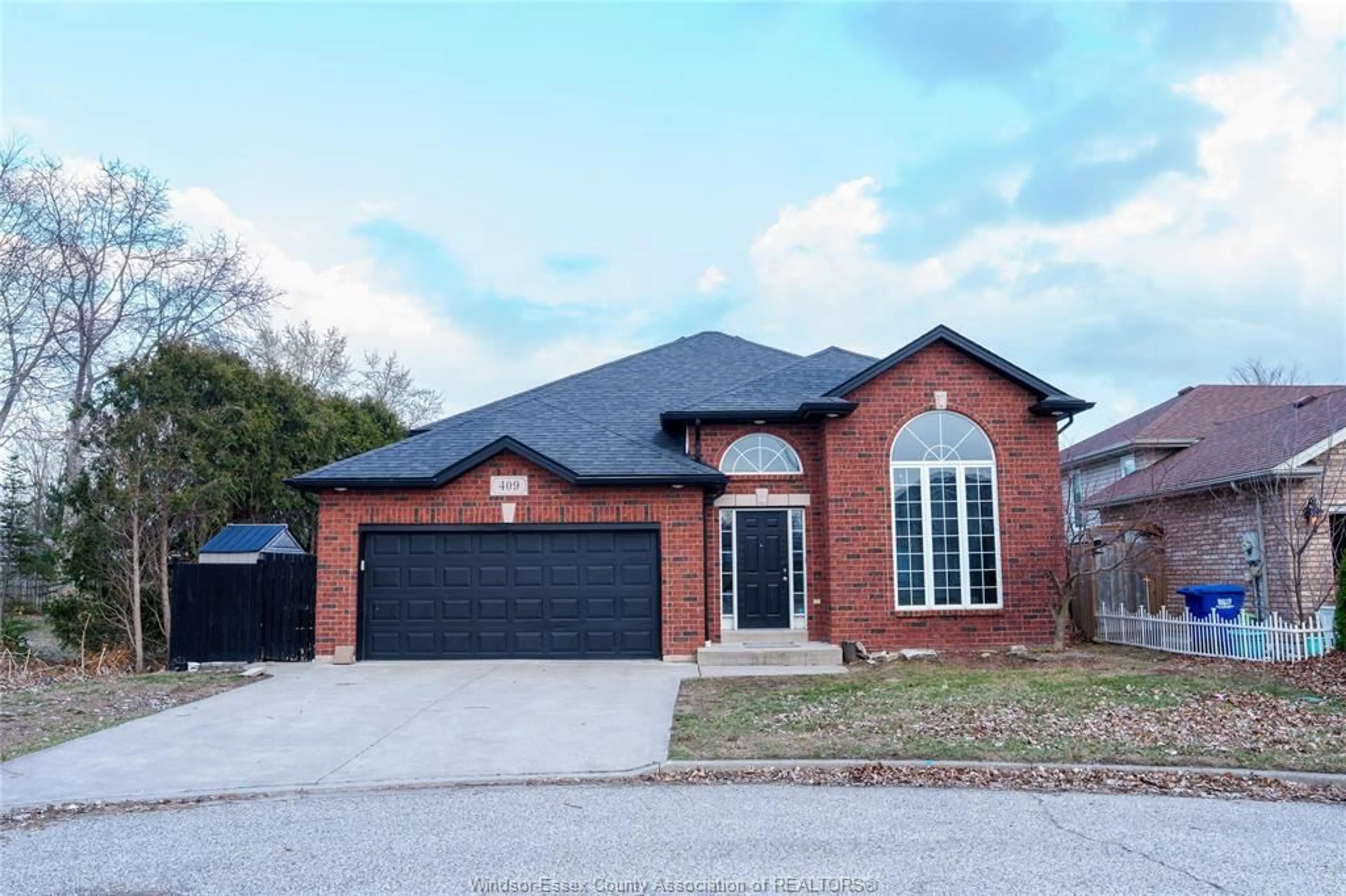 Home with brick exterior material, street for 409 RENE Dr, LaSalle Ontario N9J 3R2