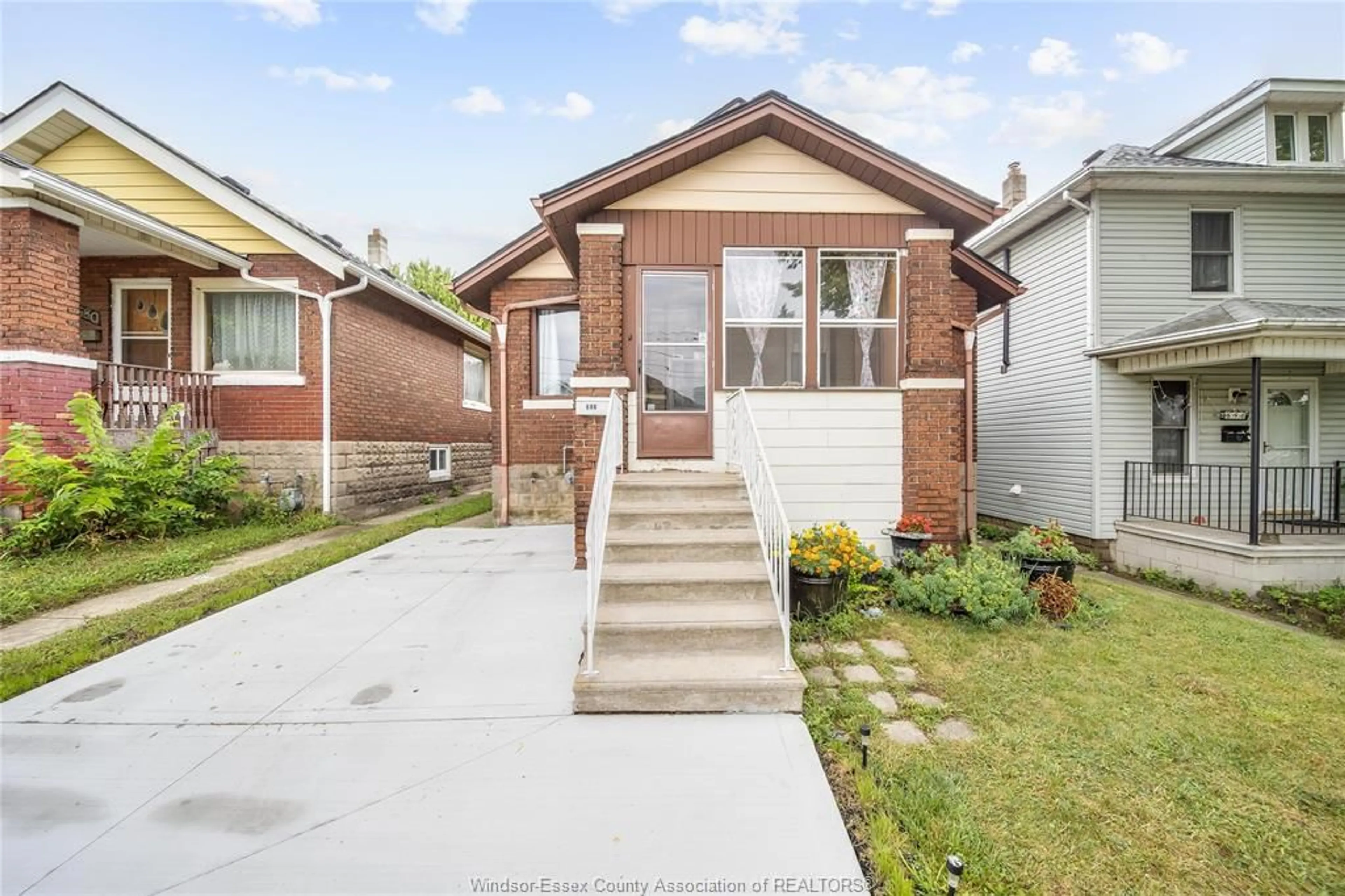 Home with brick exterior material, street for 686 MCKAY Ave, Windsor Ontario N9B 2A1