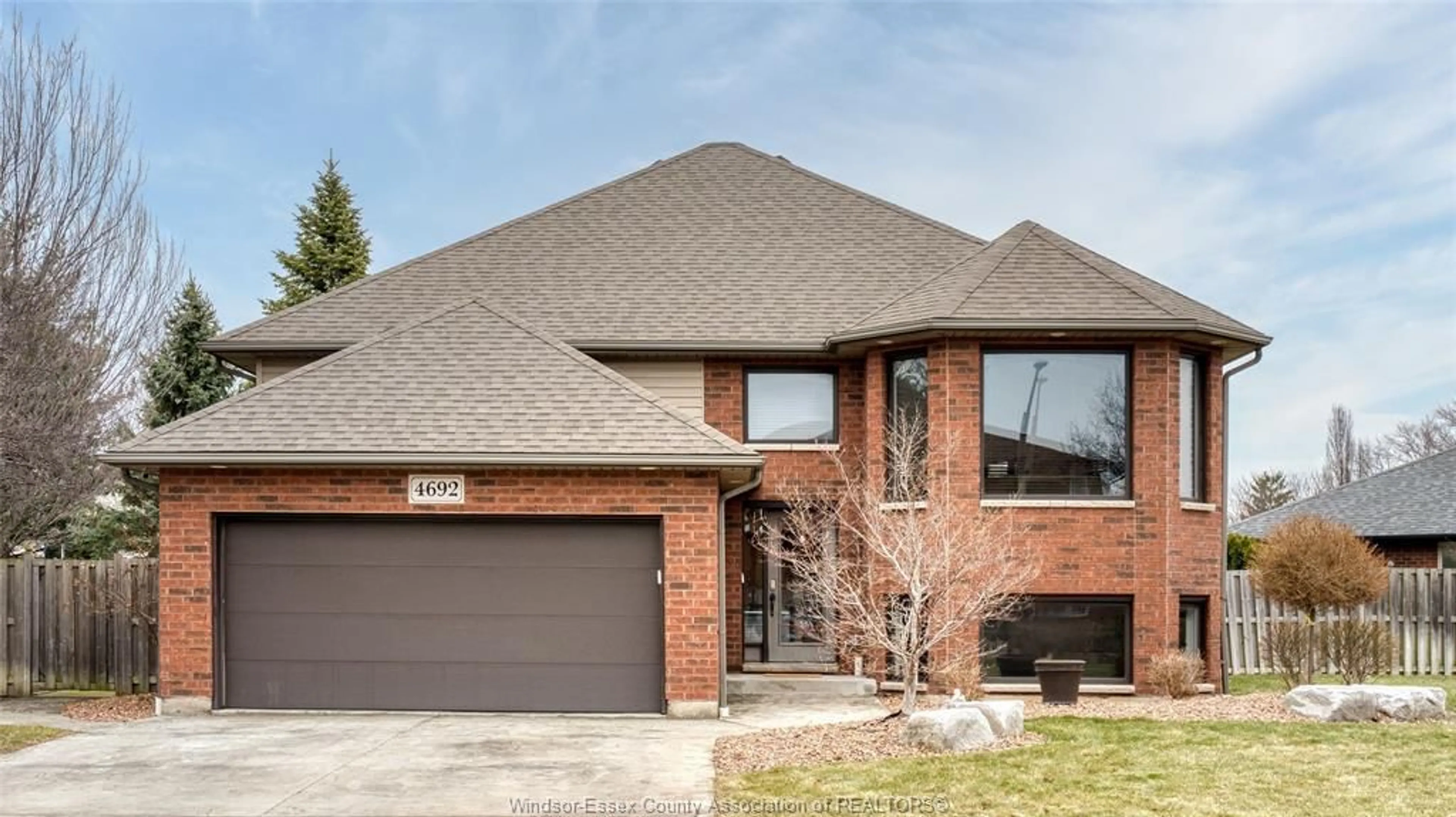 Home with brick exterior material, street for 4692 SHADETREE CRESCENT, Windsor Ontario N9G 2V1