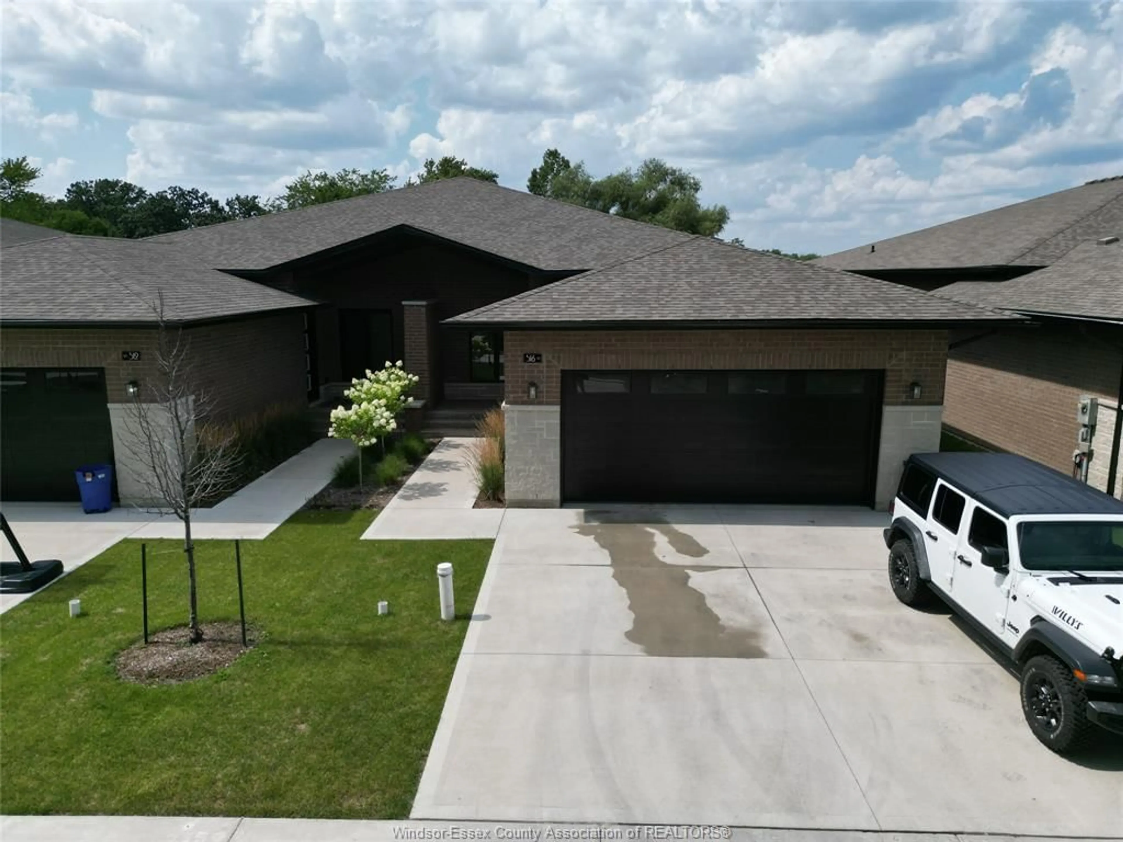 Home with brick exterior material, street for 516 LILY MAC, Windsor Ontario N6E 3N7