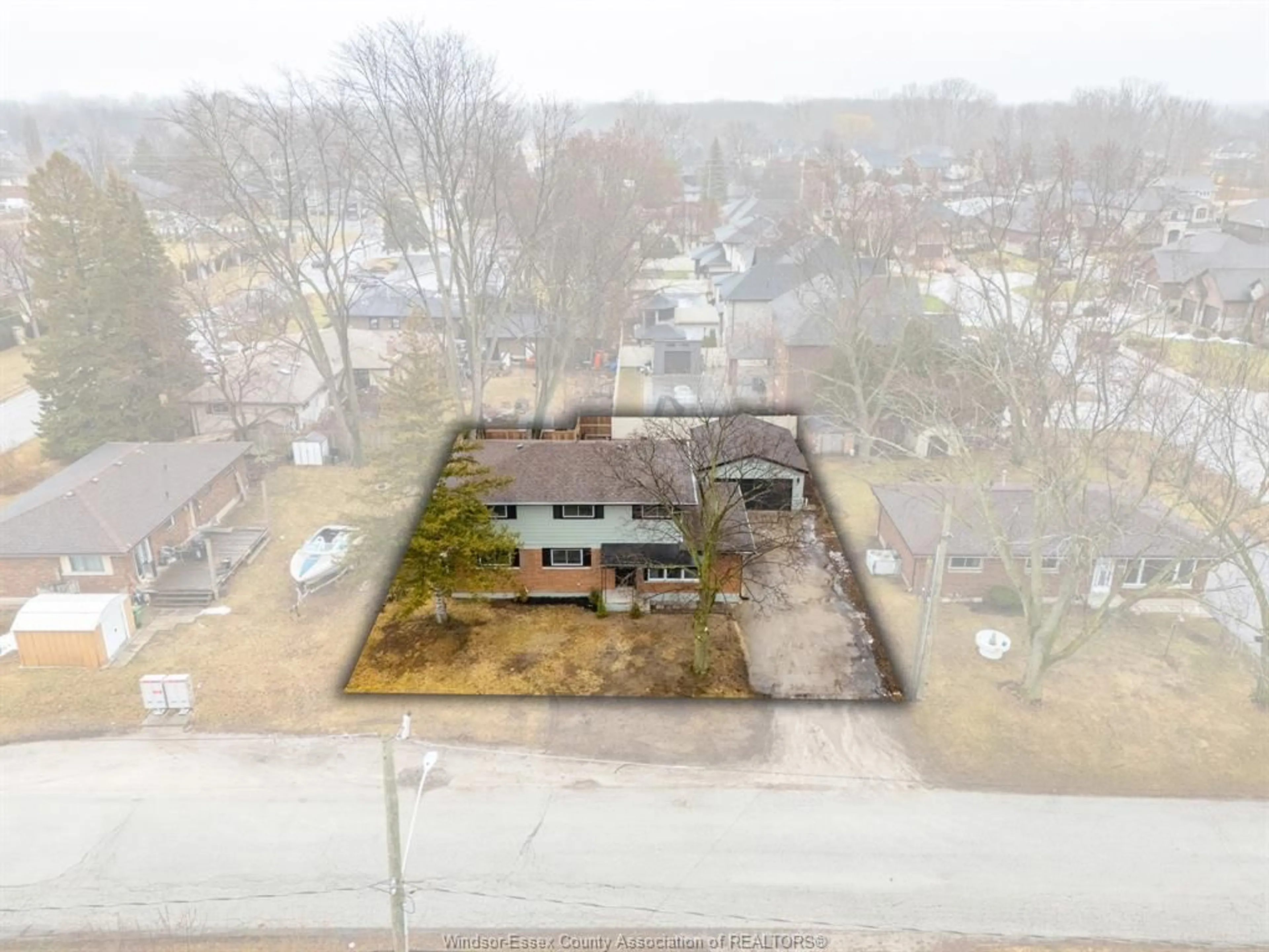 A pic from outside/outdoor area/front of a property/back of a property/a pic from drone, street for 6100 QUICK Ave, LaSalle Ontario N9J 3C7