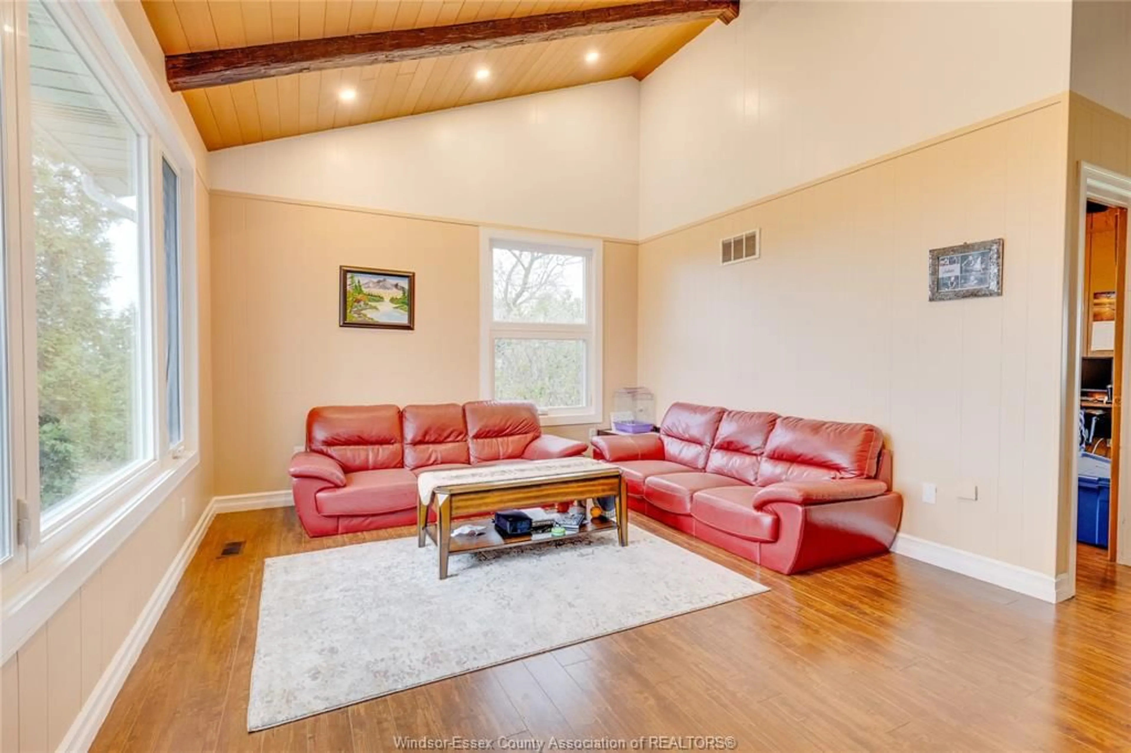 Living room with furniture, wood/laminate floor for 4996 BADDER Line, Merlin Ontario N0P 1W0