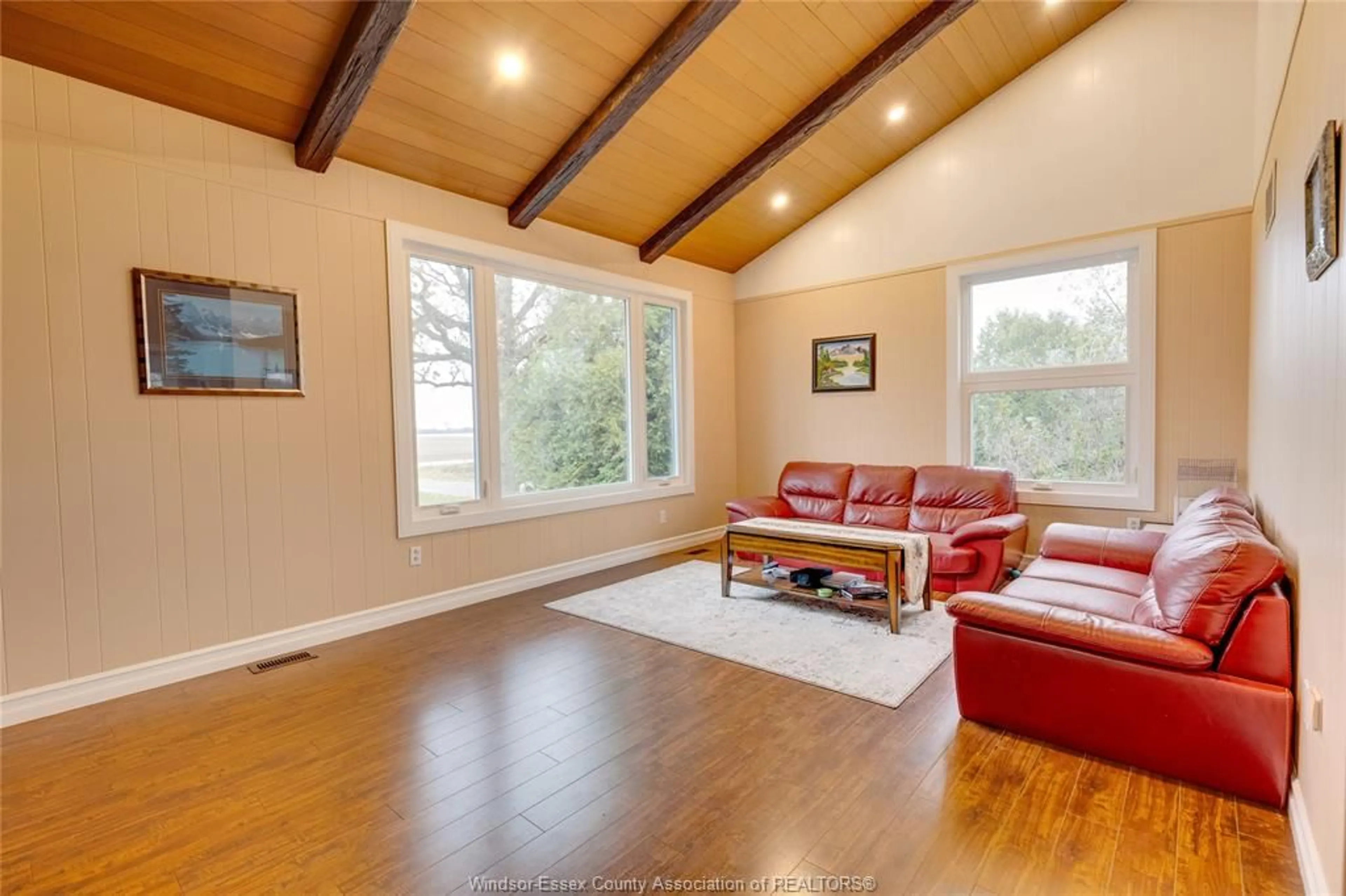 Living room with furniture, wood/laminate floor for 4996 BADDER Line, Merlin Ontario N0P 1W0