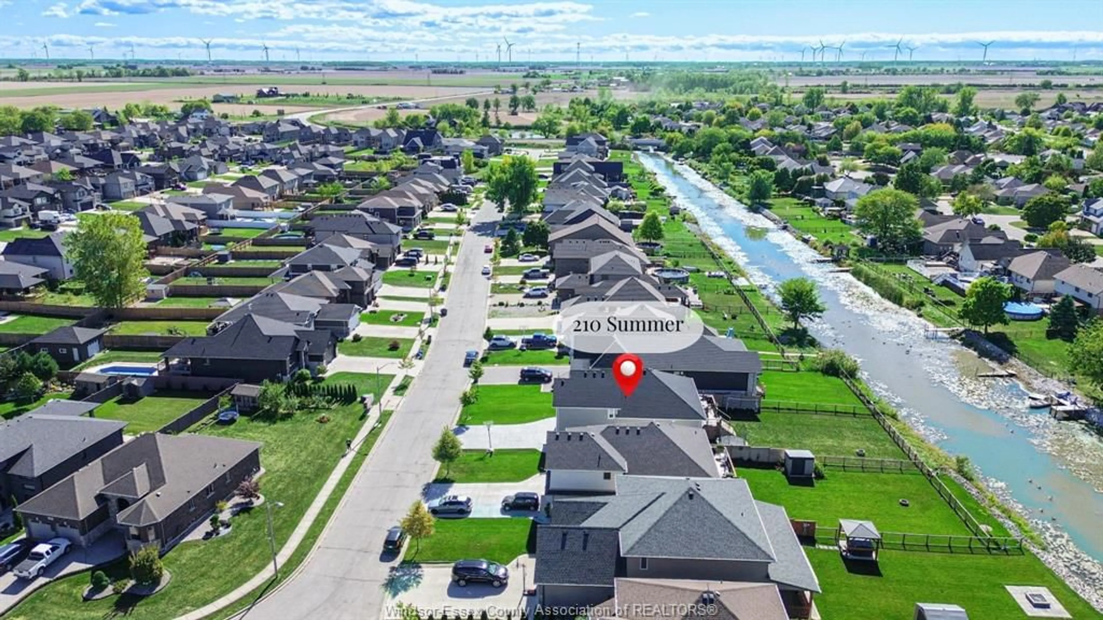 A pic from outside/outdoor area/front of a property/back of a property/a pic from drone, street for 210 SUMMER, Belle River Ontario N0R 1A0