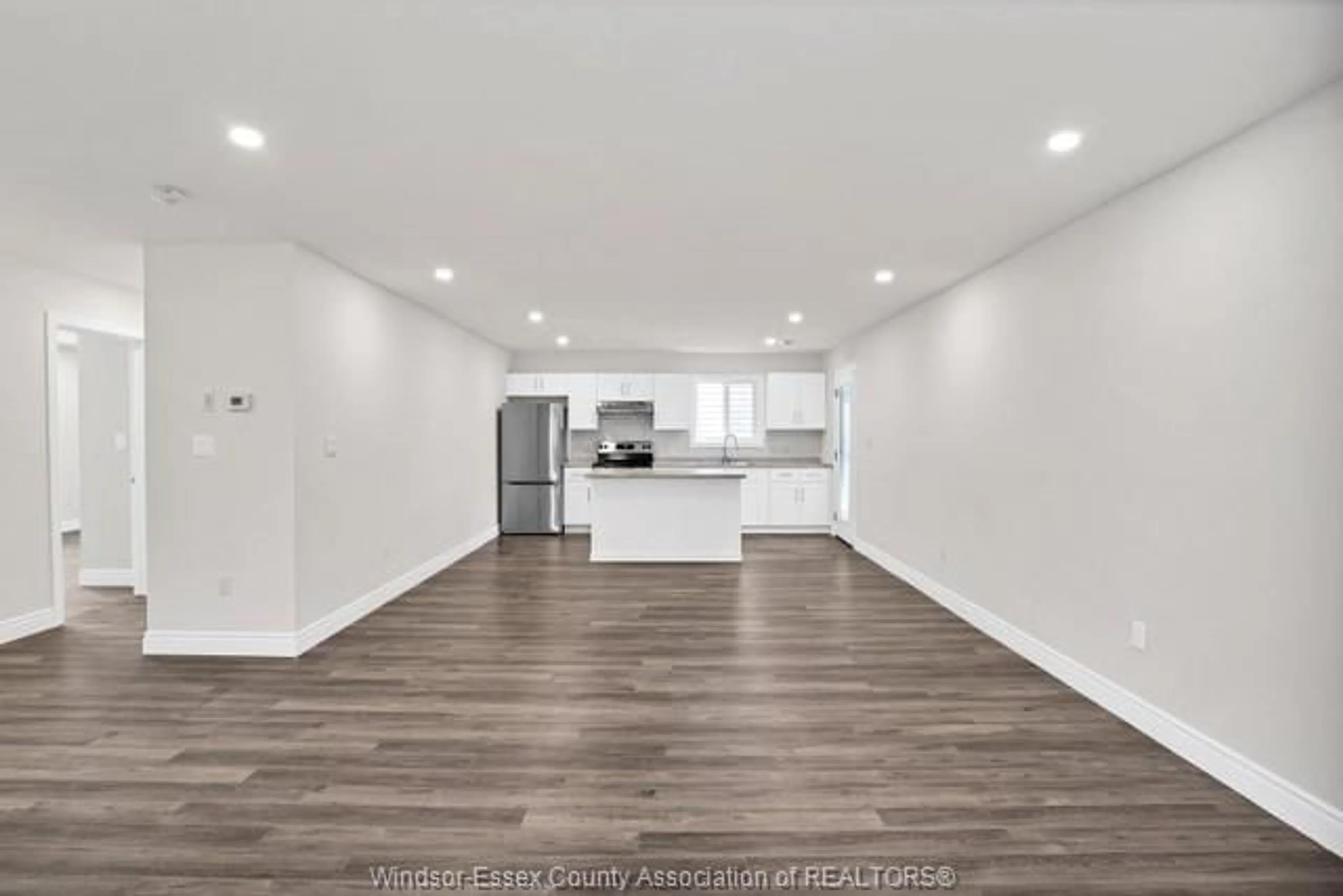 Open concept kitchen, wood/laminate floor for 423 LOGAN #1, 2, Windsor Ontario N8X 2V3