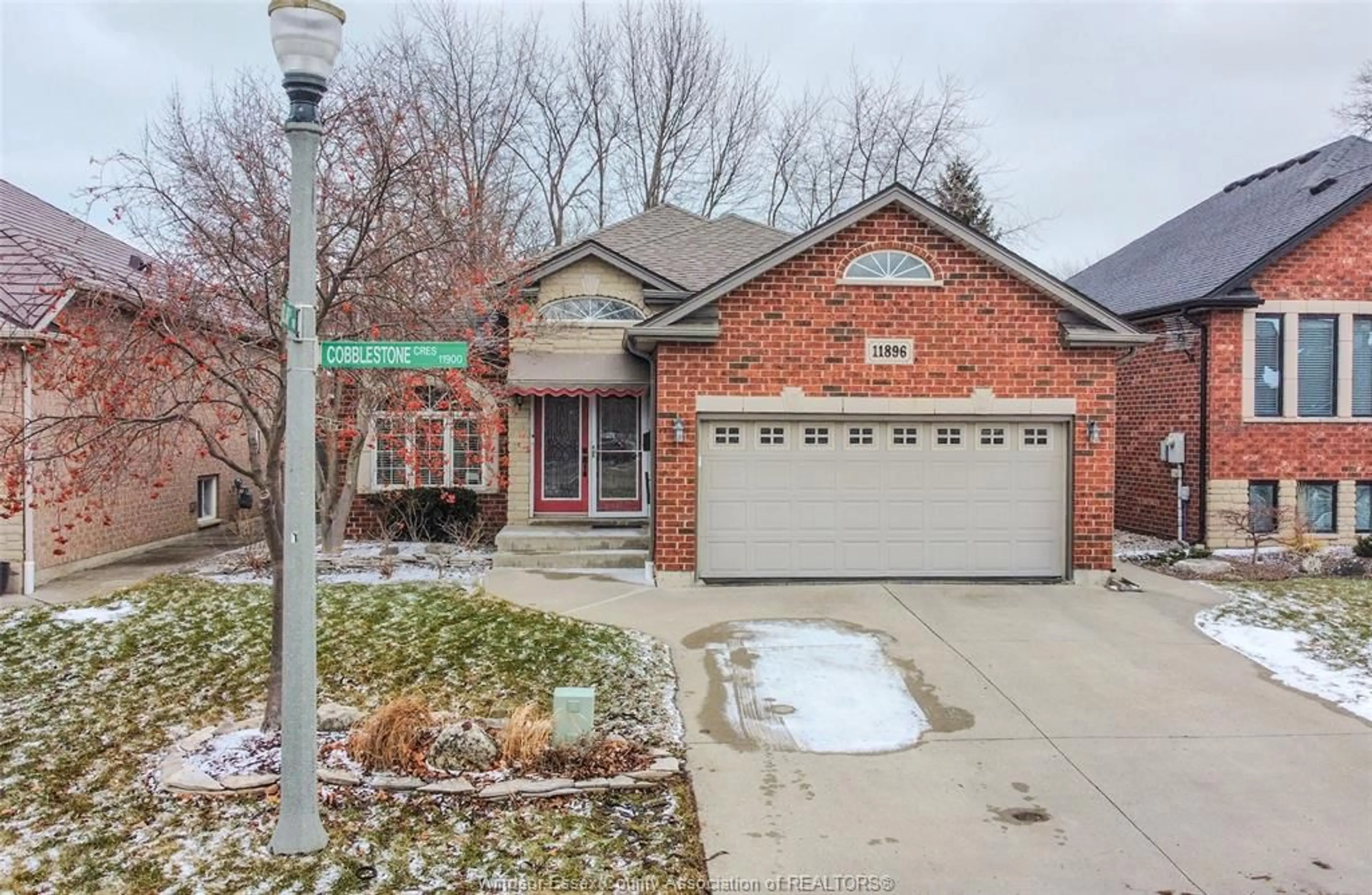Home with brick exterior material, street for 11896 Cobblestone Cres, Windsor Ontario N8P 1T6