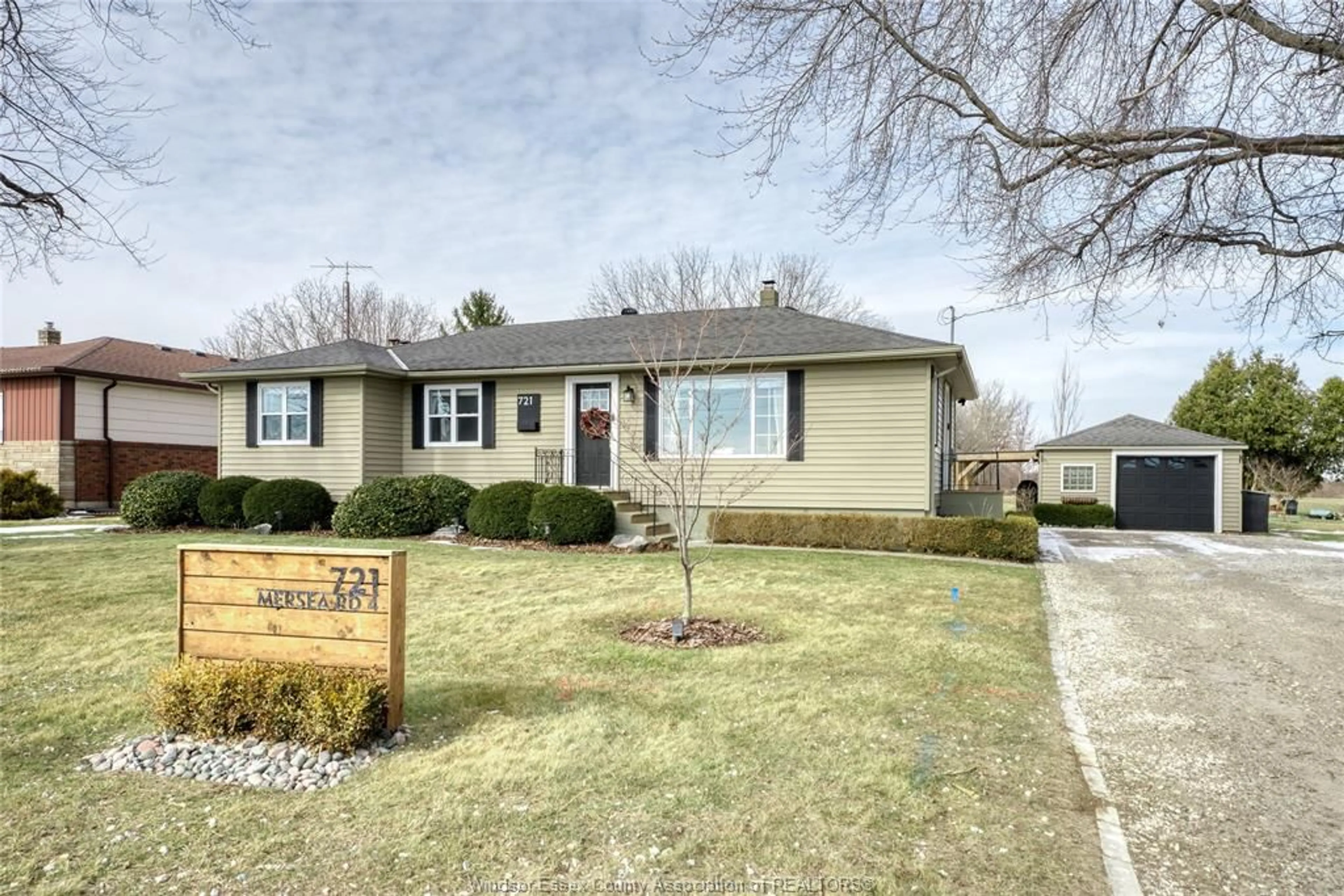 Home with vinyl exterior material, street for 721 MERSEA RD 4, Leamington Ontario N8H 3V6