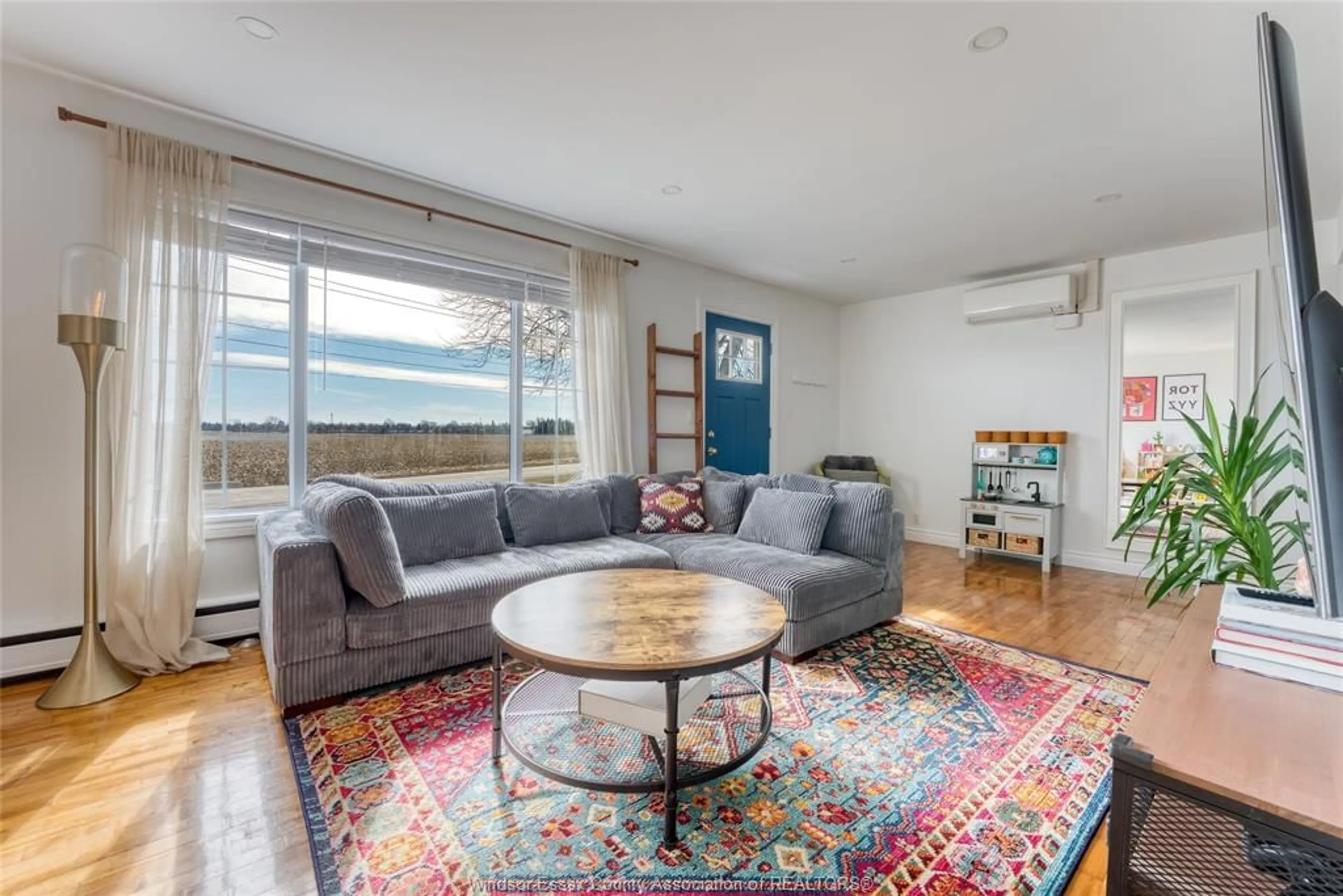 Living room with furniture, unknown for 721 MERSEA RD 4, Leamington Ontario N8H 3V6