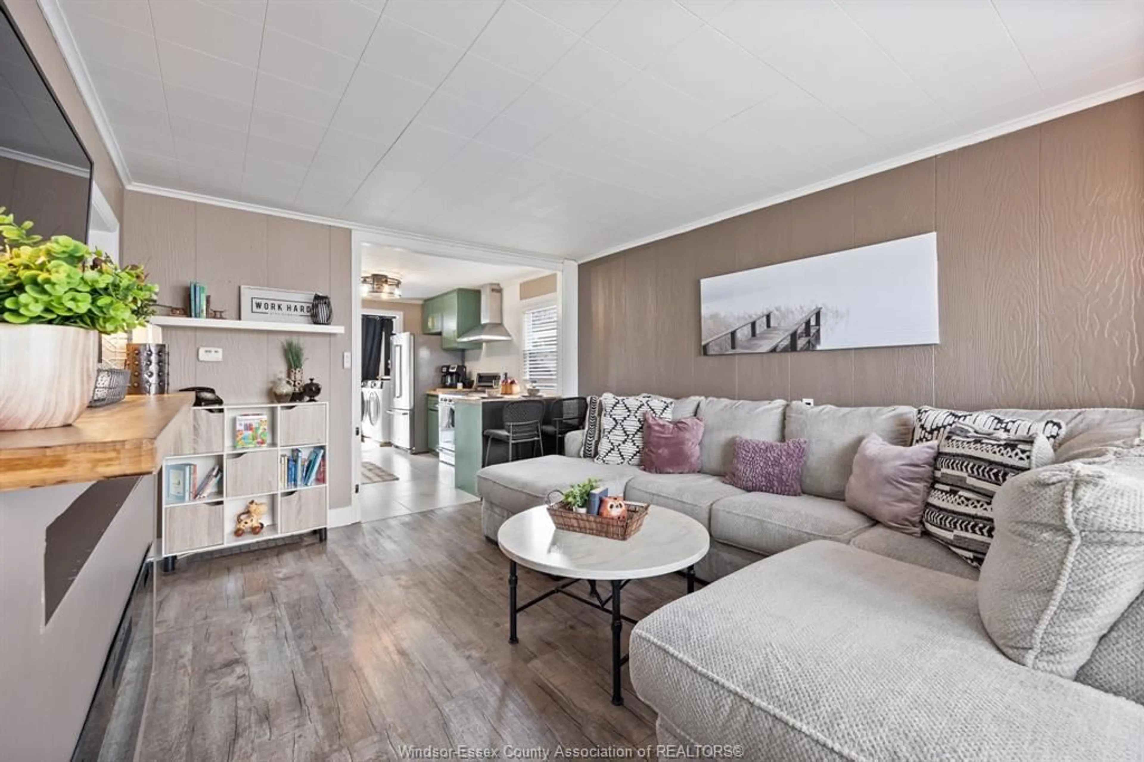 Living room with furniture, wood/laminate floor for 1753 WESTCOTT, Windsor Ontario N8Y 4E1