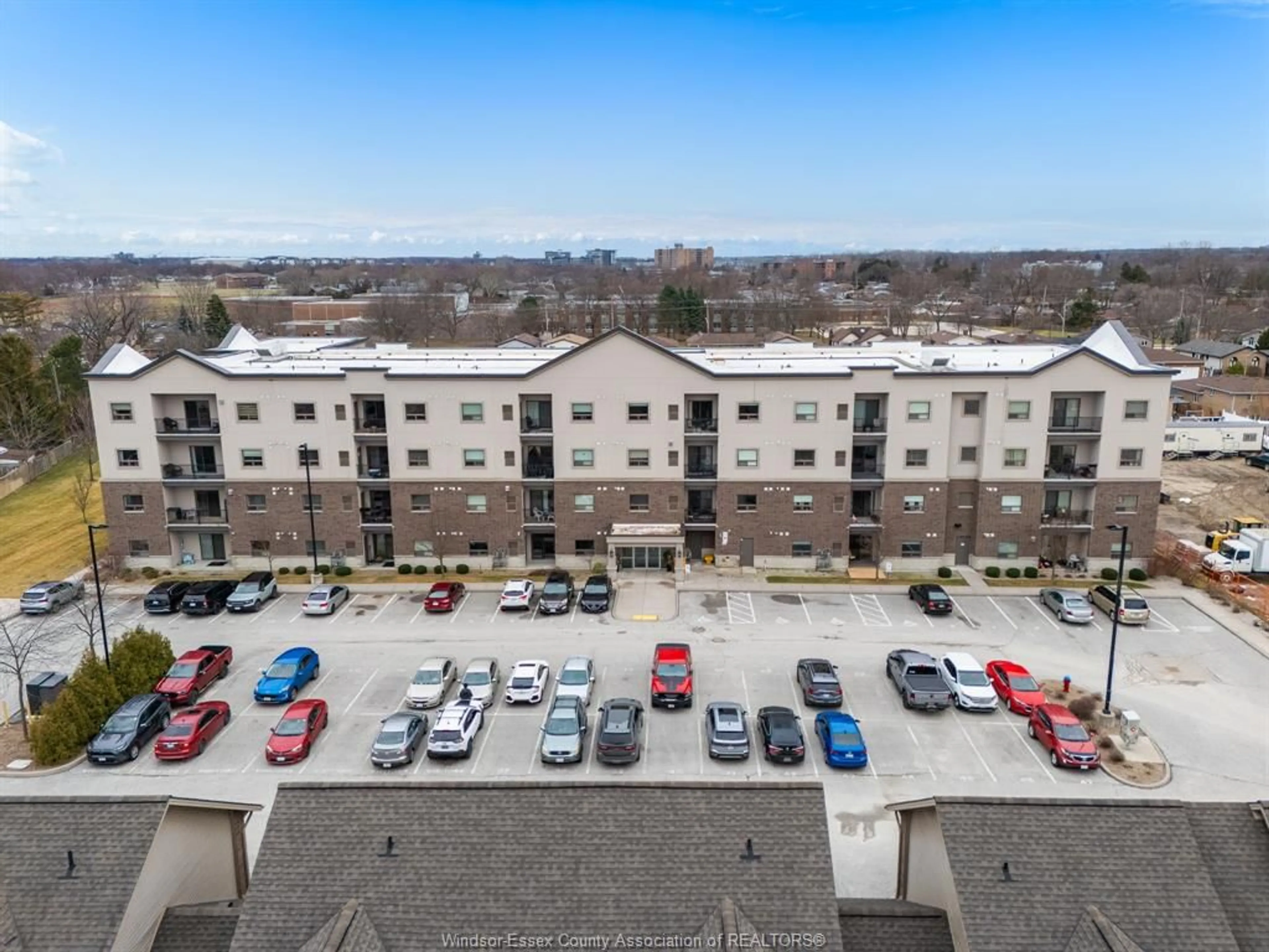 A pic from outside/outdoor area/front of a property/back of a property/a pic from drone, city buildings view from balcony for 8475 Wyandotte St #111, Windsor Ontario N8S 0A4