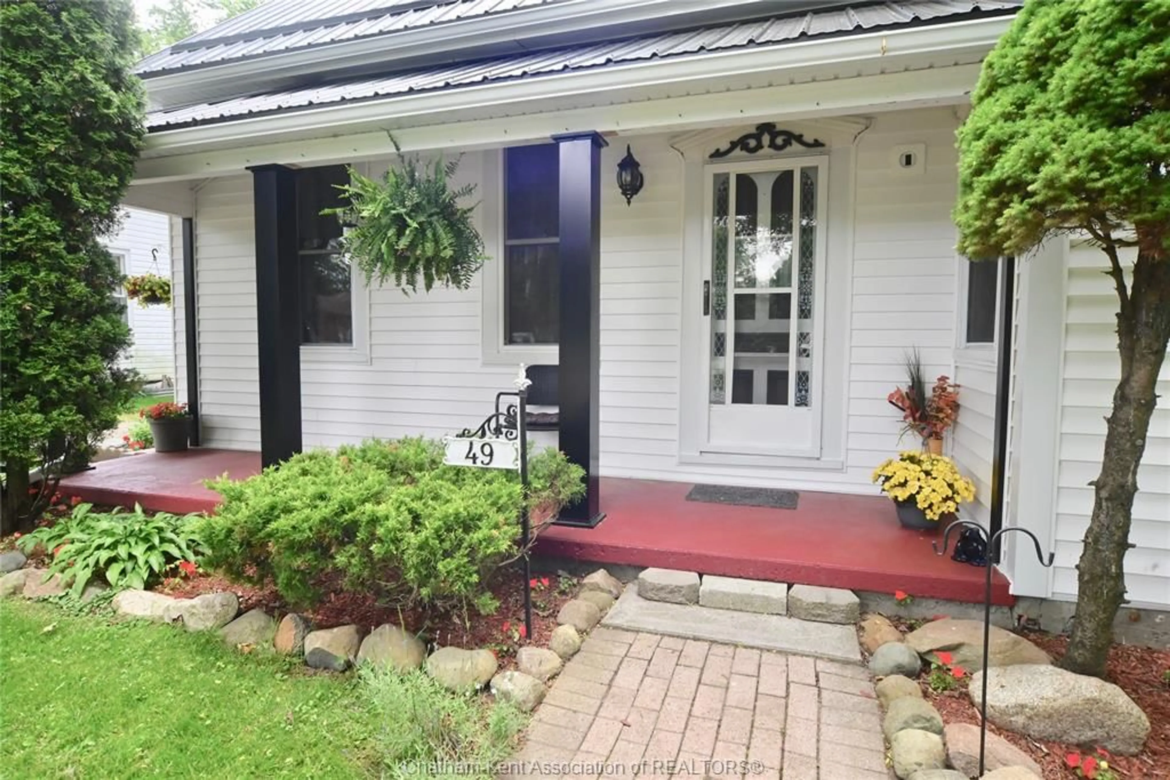 Home with brick exterior material, street for 49 Erie St, Ridgetown Ontario N0P 2C0