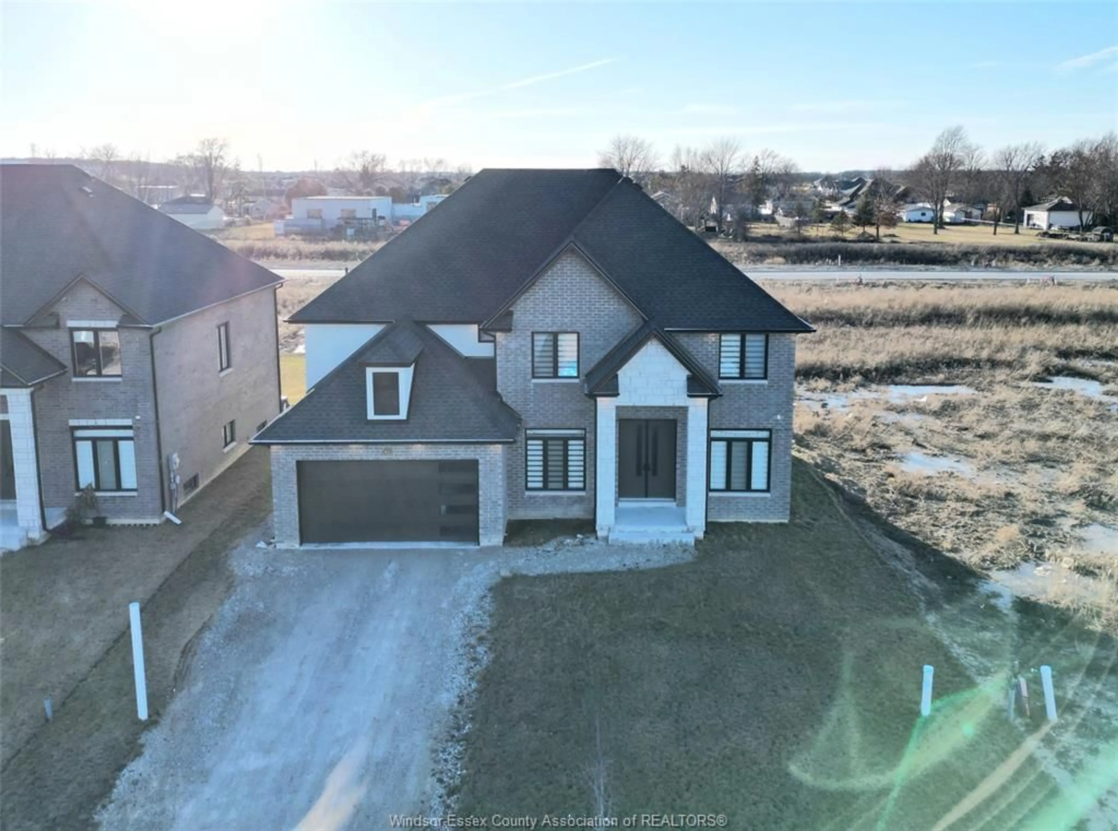 A pic from outside/outdoor area/front of a property/back of a property/a pic from drone, street for 518 VENETO St, Lakeshore Ontario N8L 0K4
