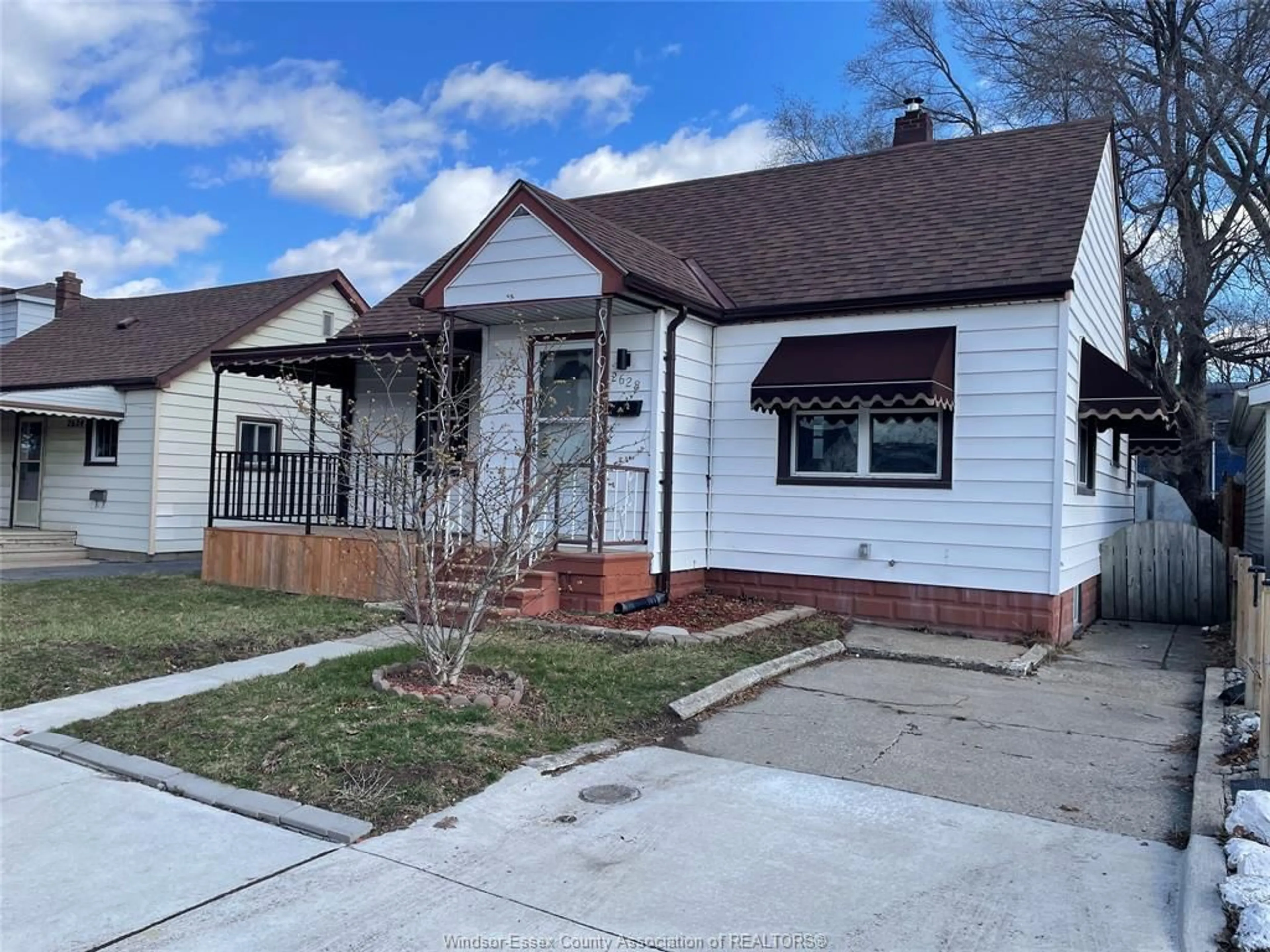 Home with vinyl exterior material, street for 2628 ALEXIS, Windsor Ontario N8W 3Z9