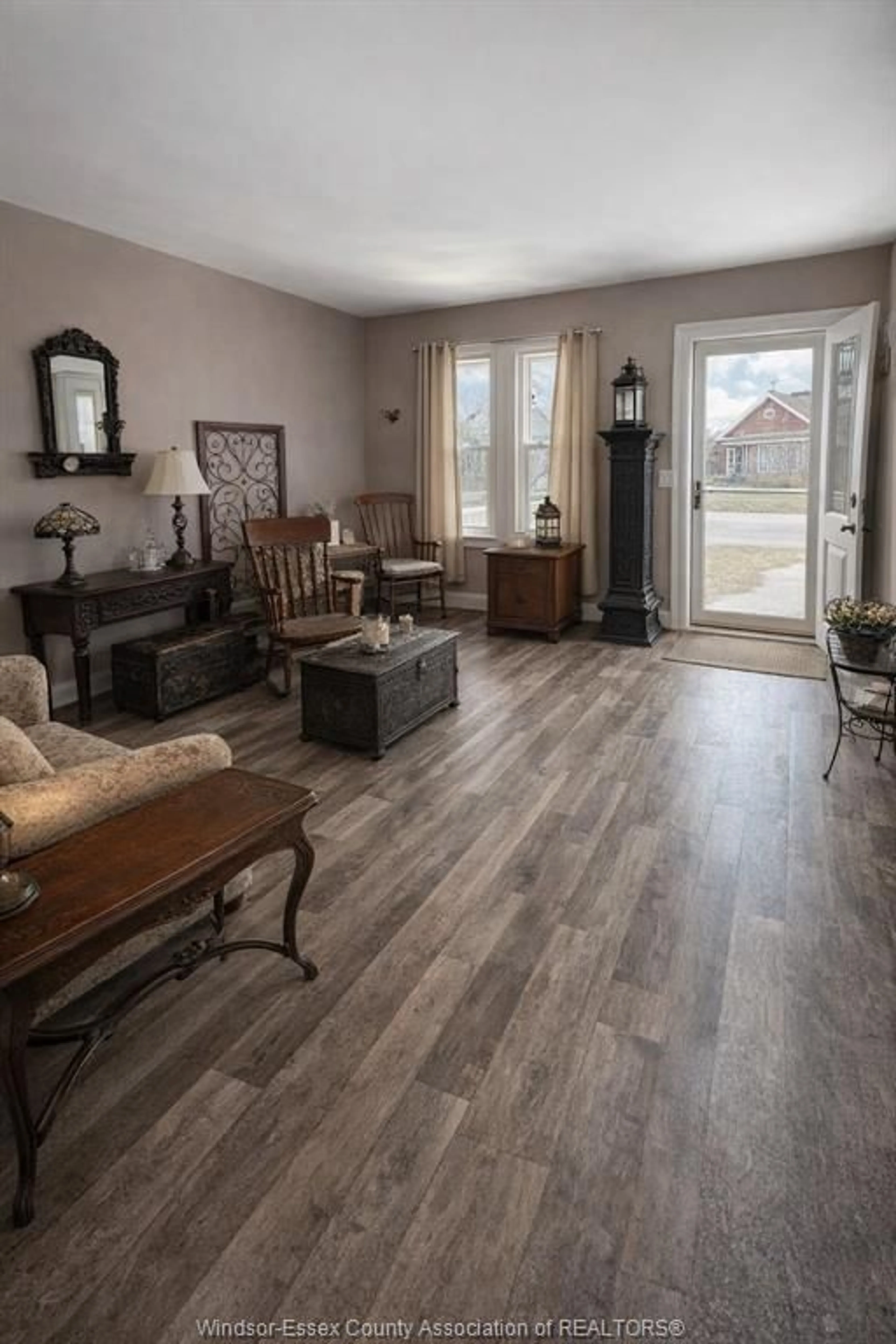 Living room with furniture, wood/laminate floor for 1816 HICKORY, Windsor Ontario N8W 3X2