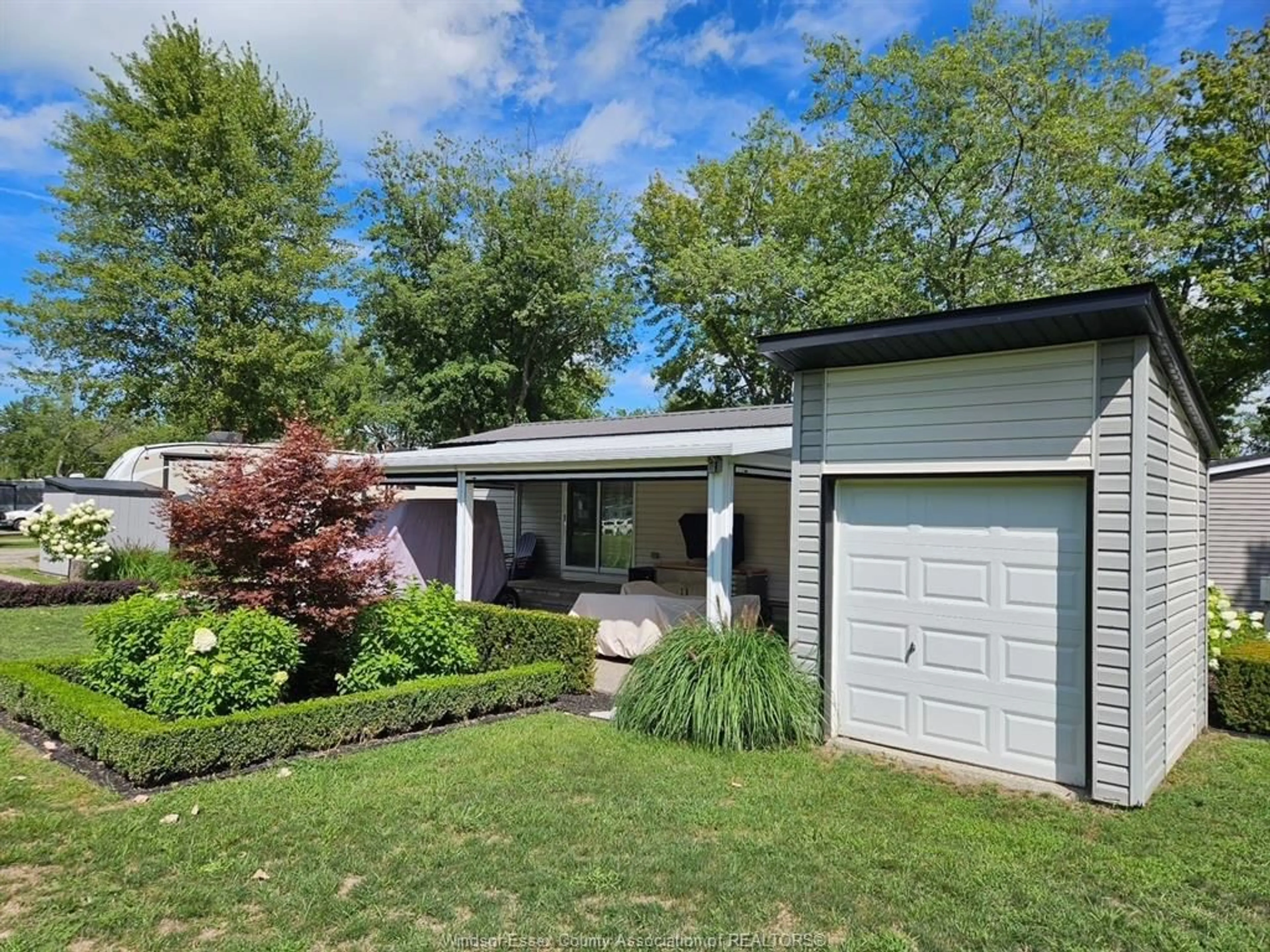 Home with vinyl exterior material, street for 981 COUNTY RD 2 #439, Lakeshore Ontario N0R 1A0