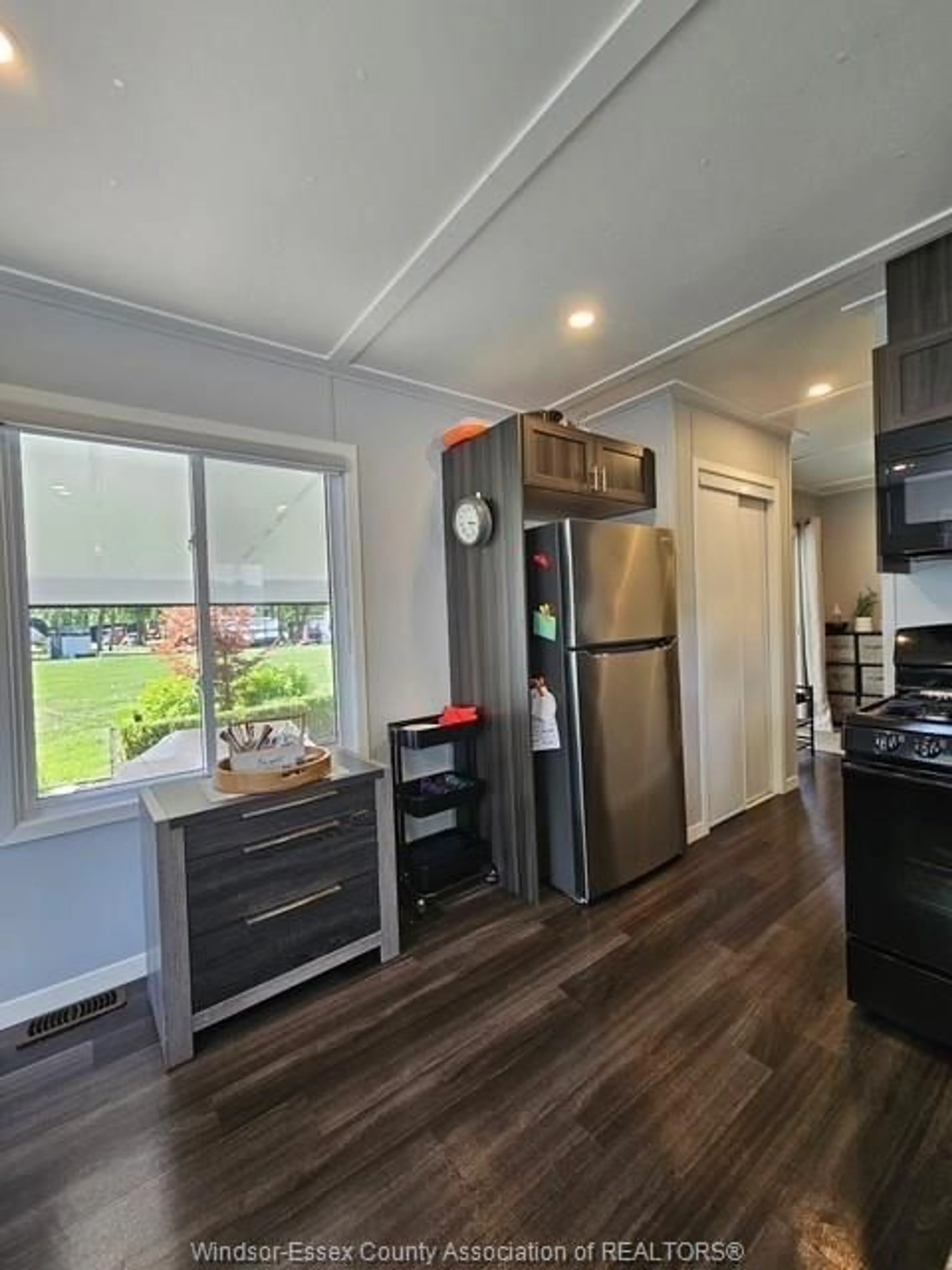 Open concept kitchen, wood/laminate floor for 981 COUNTY RD 2 #439, Lakeshore Ontario N0R 1A0